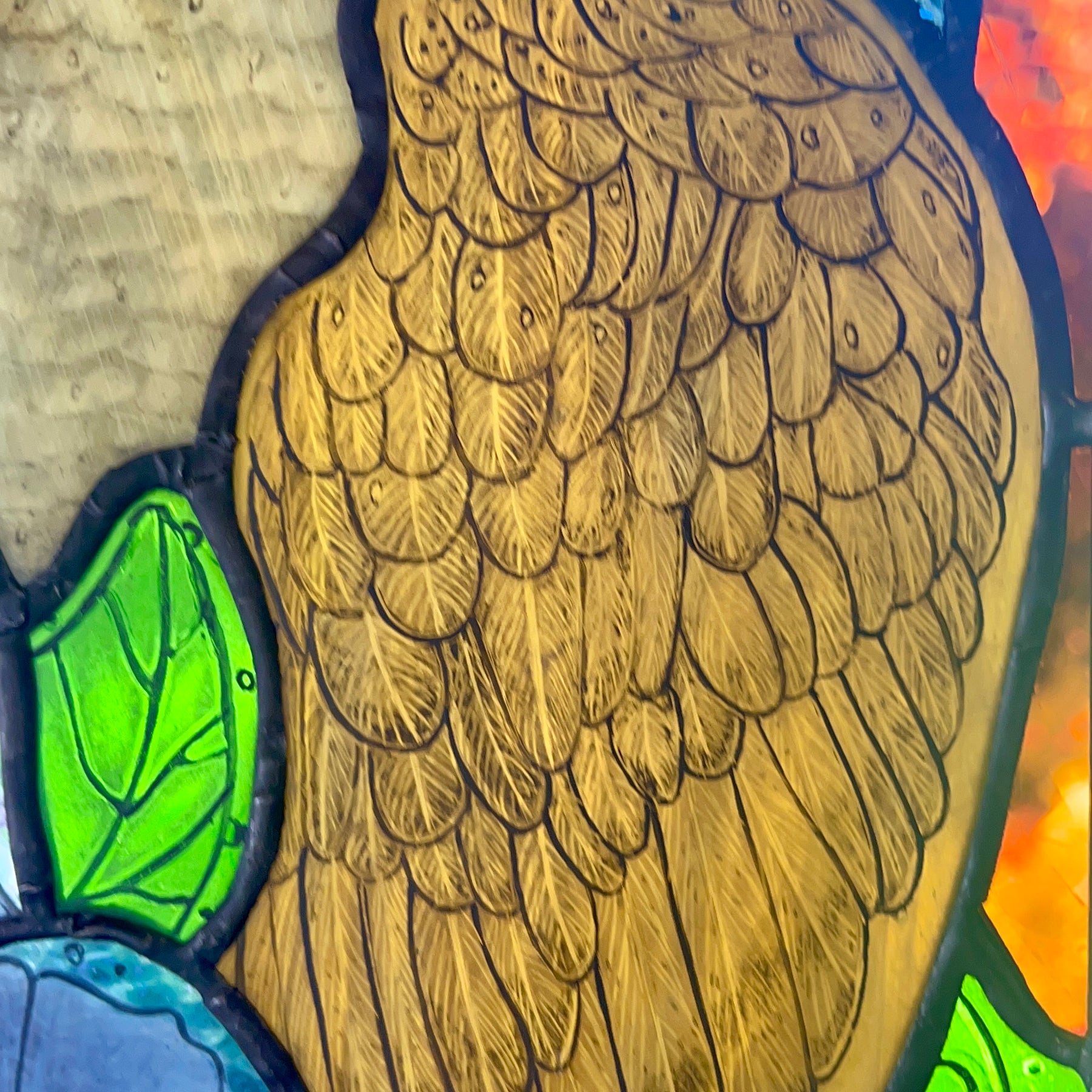 Stained glass owl panel.
