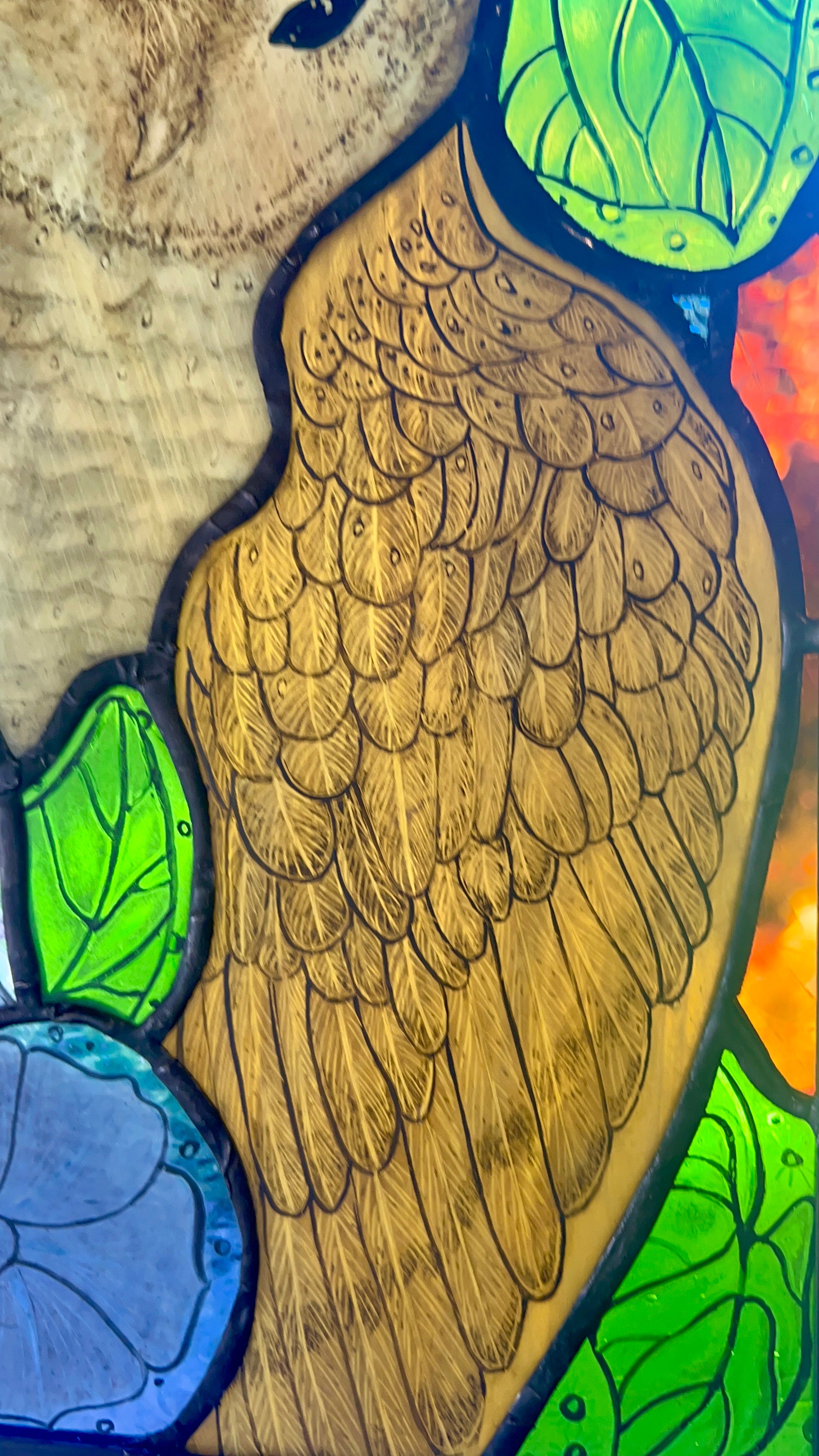 Stained glass owl panel.