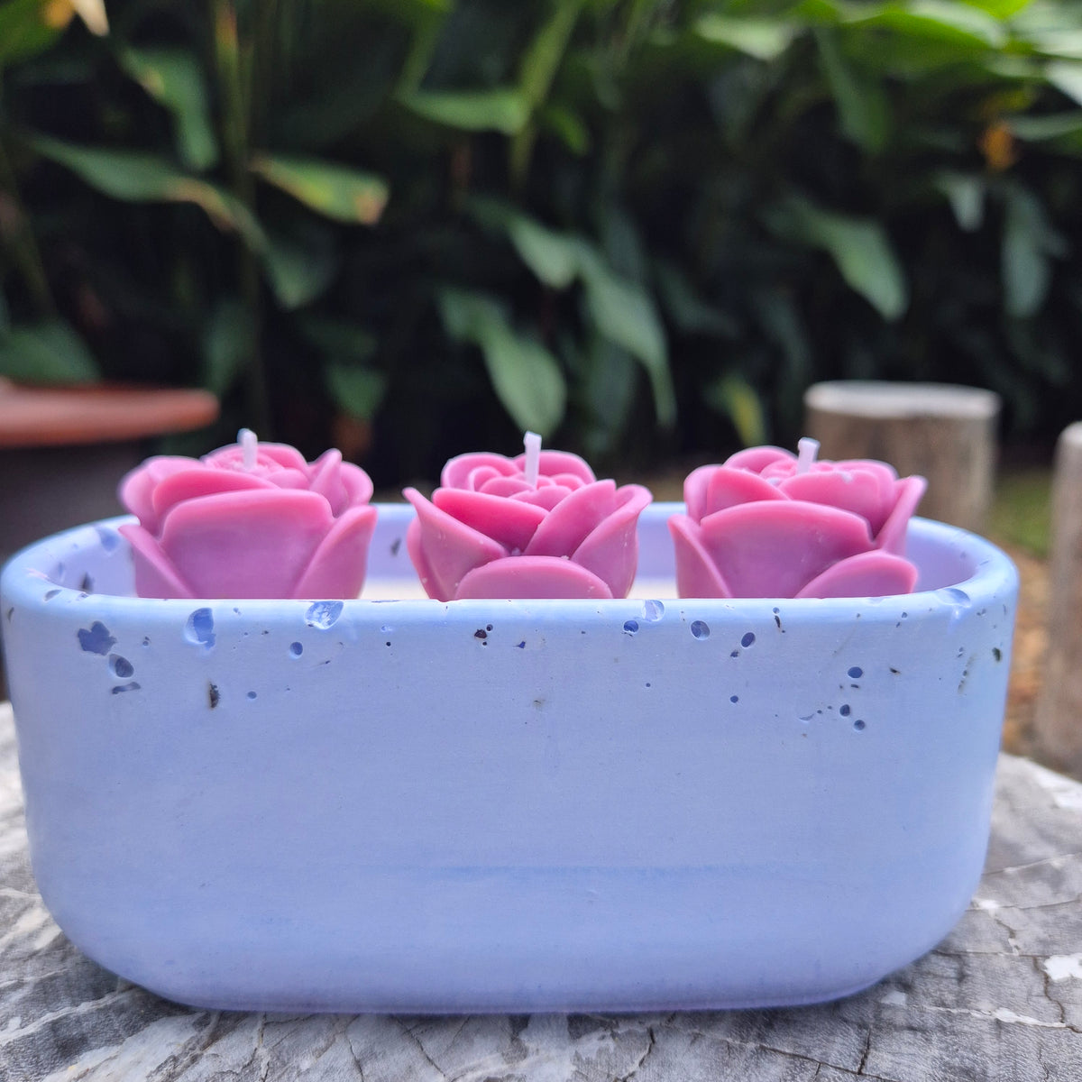 Pale blue concrete bowl candle with quartz stones and roses