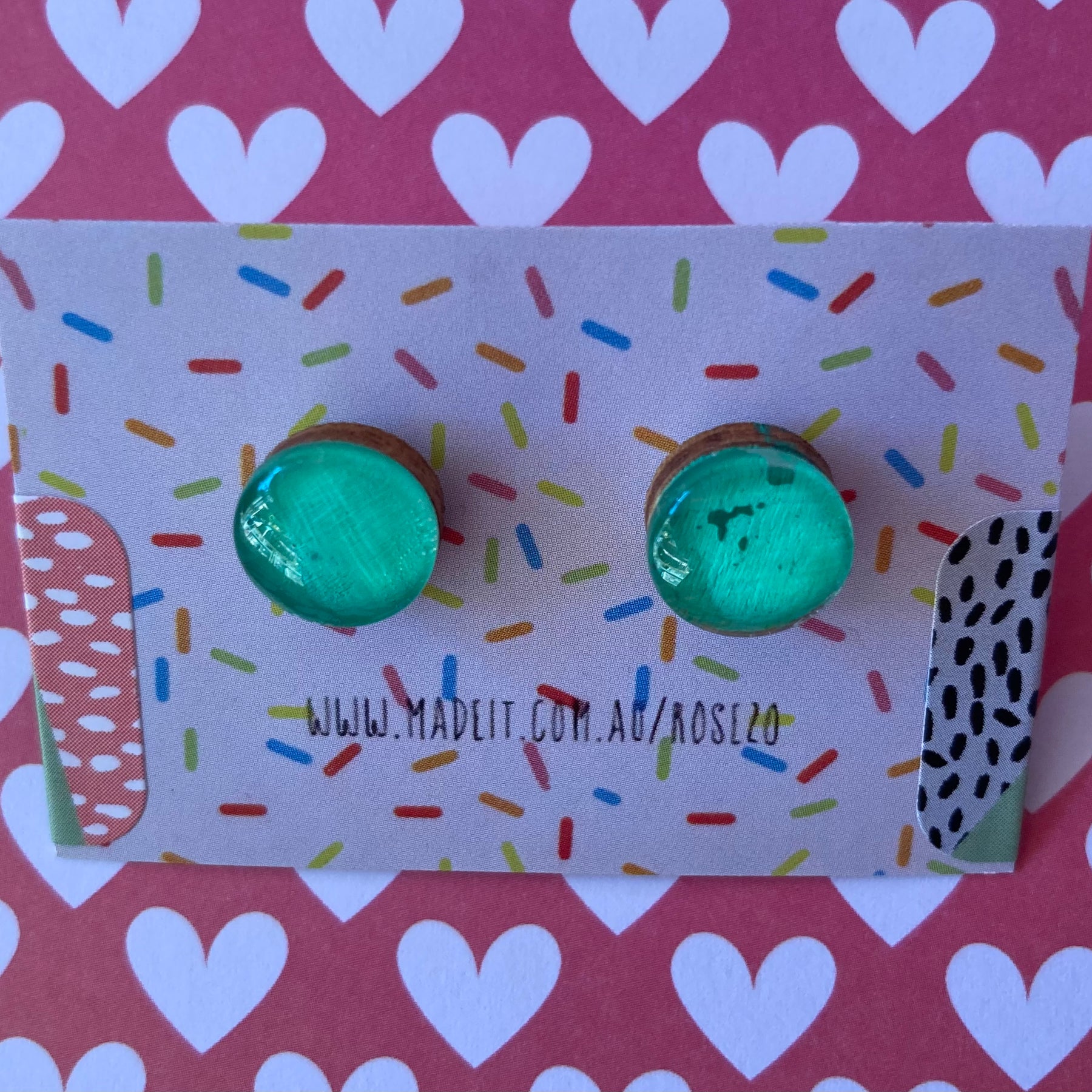 Green glass domed studs