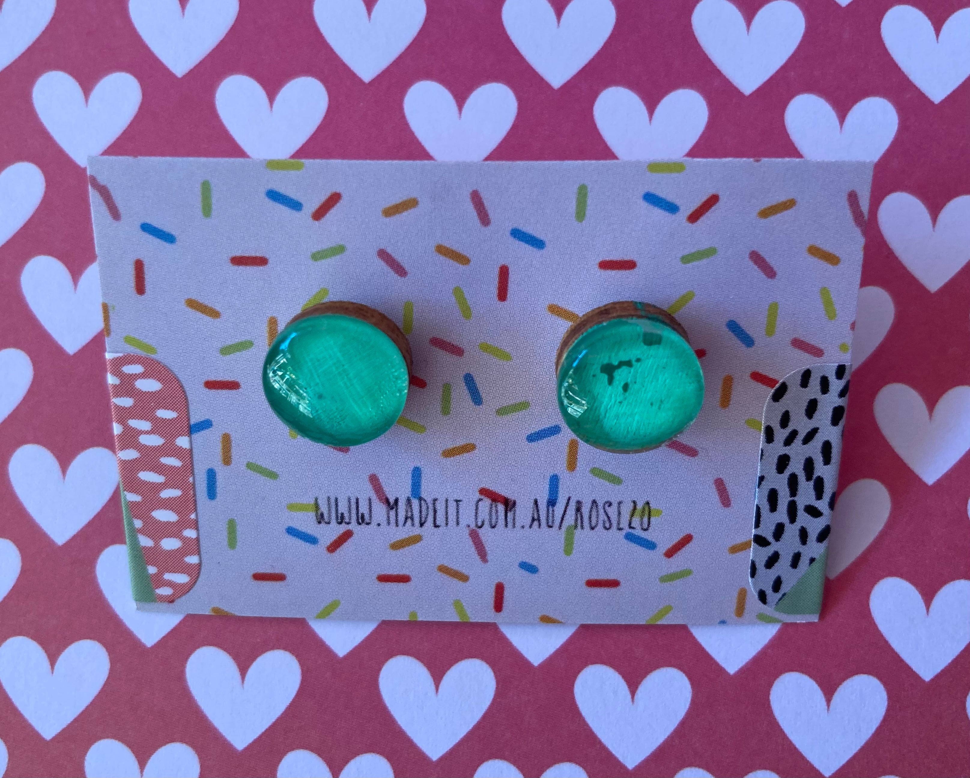 Green glass domed studs