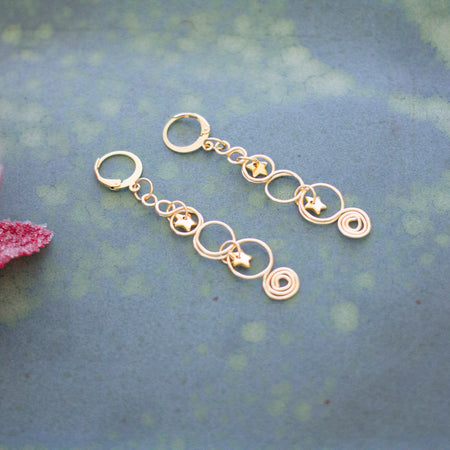 Gold Looped Earrings With Twinkling Stars