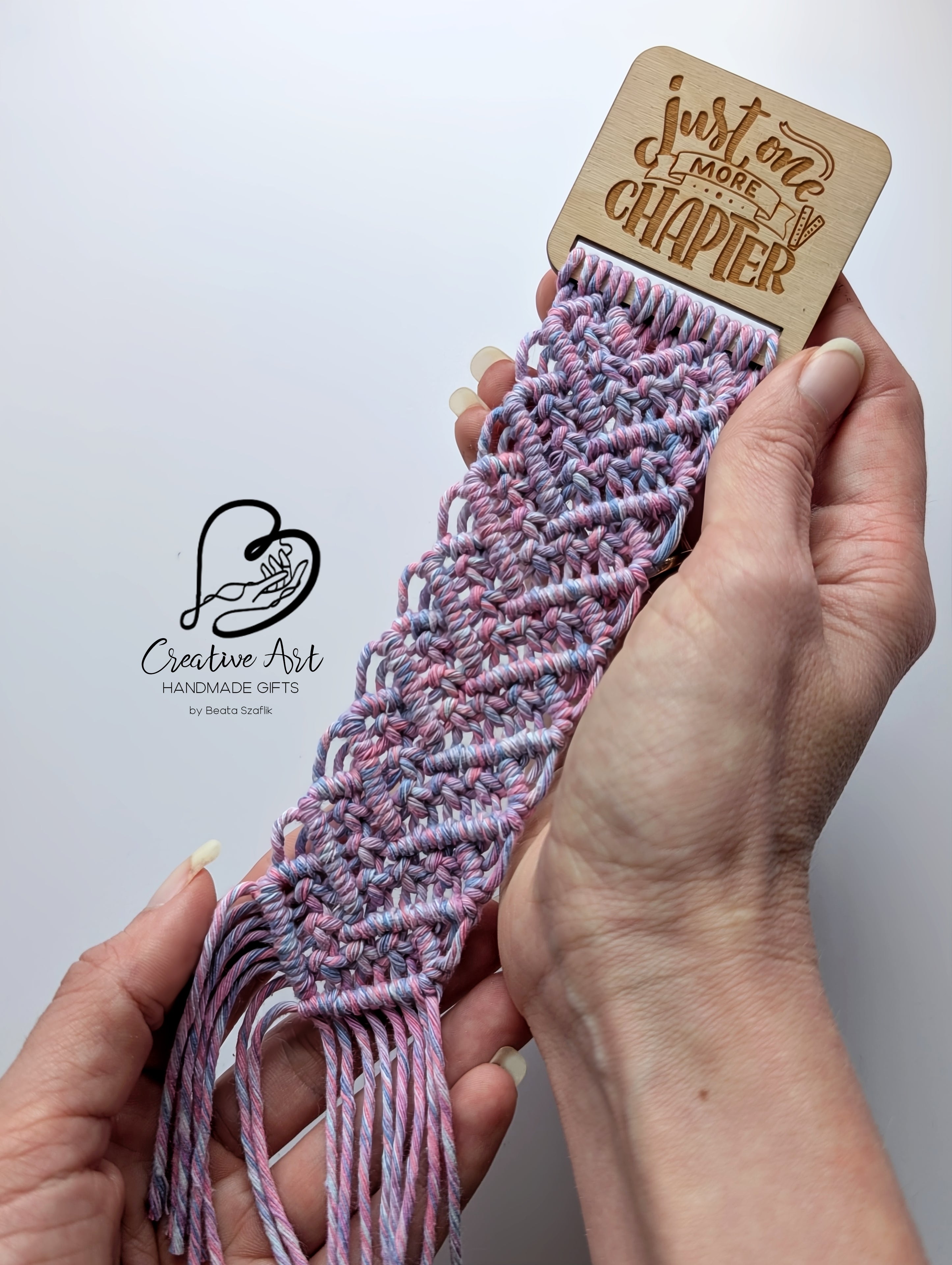 Macrame bookmark on wooden base
