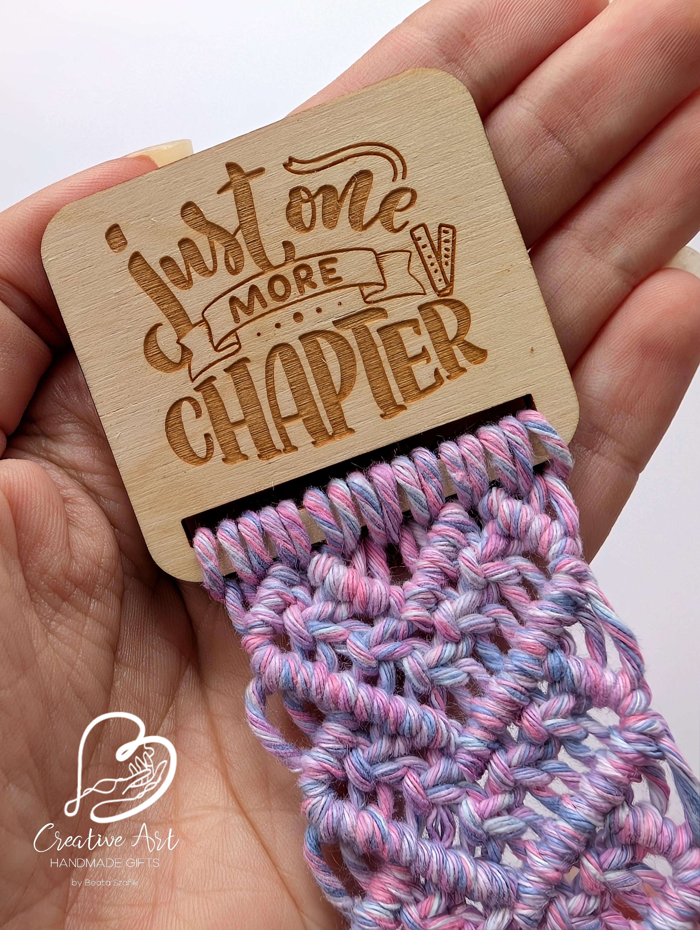 Macrame bookmark on wooden base