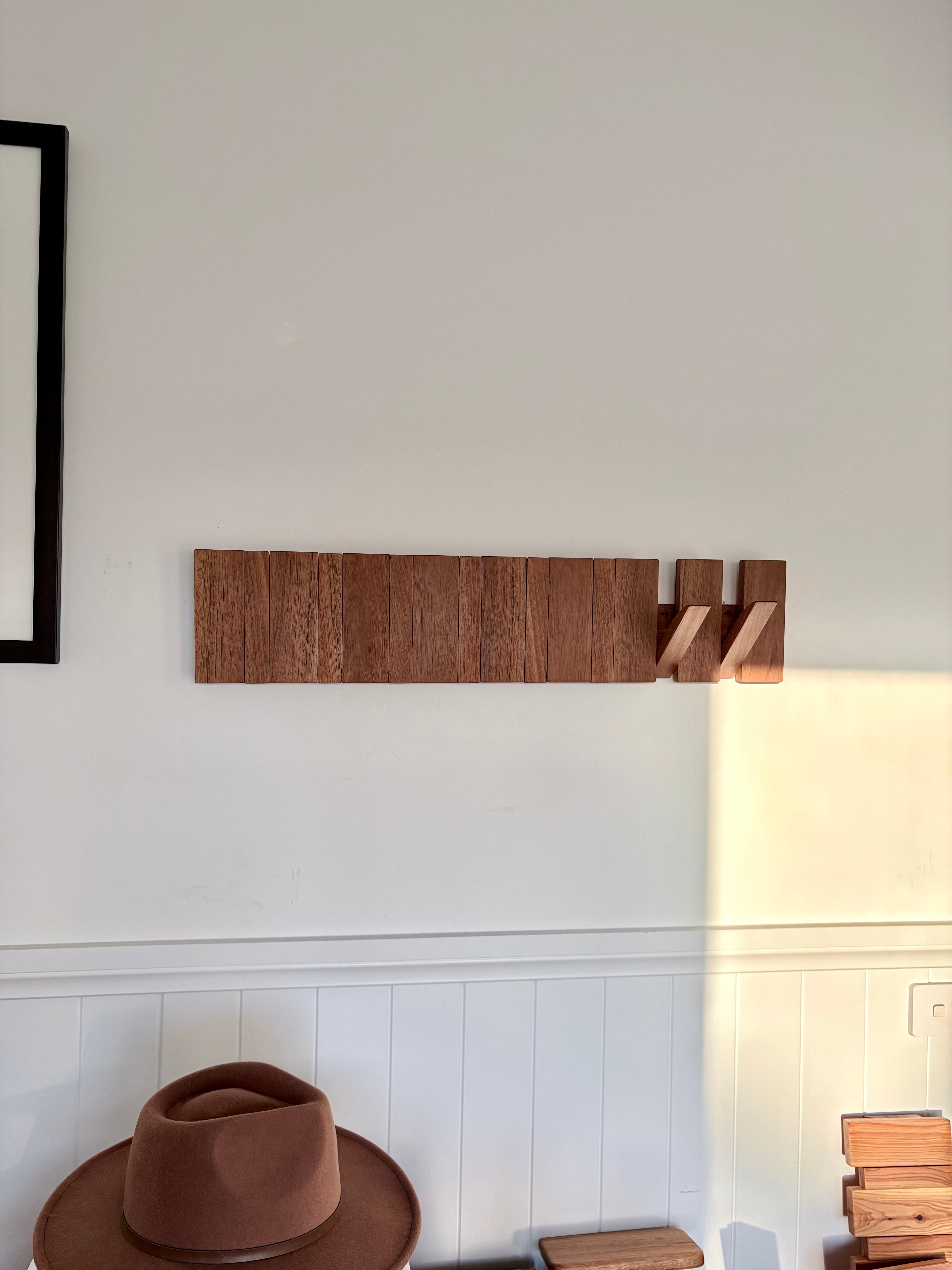 Grey box piano style coat rack