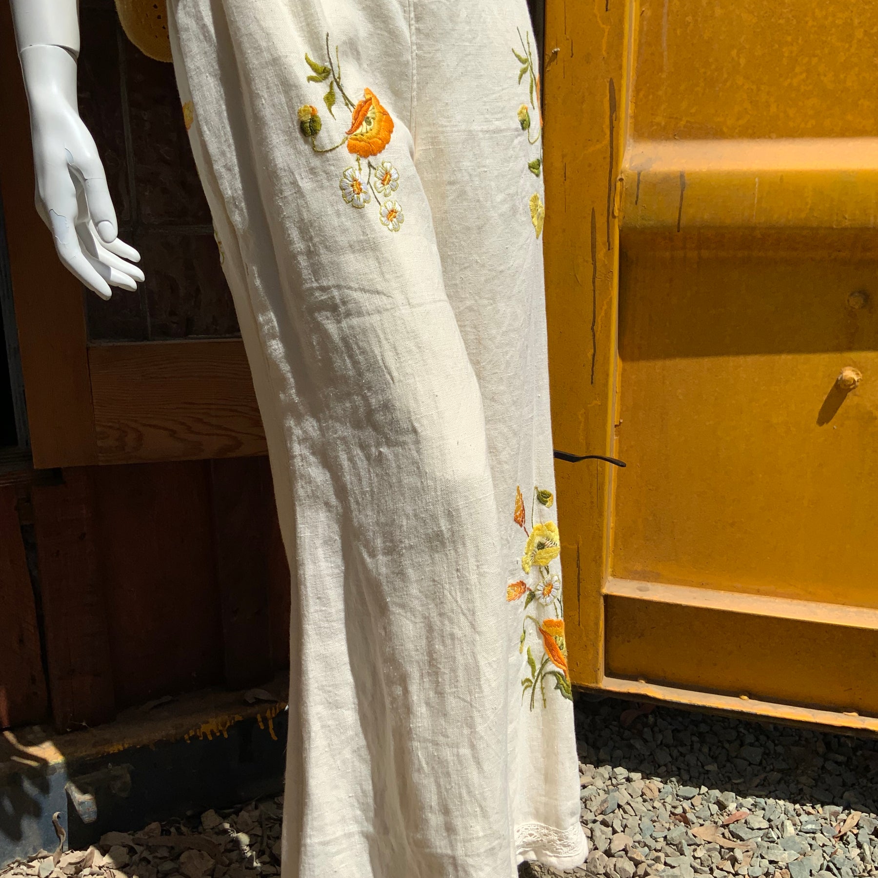 Upcycled embroidered linen tablecloth into "Flower Power" Bell Bottoms