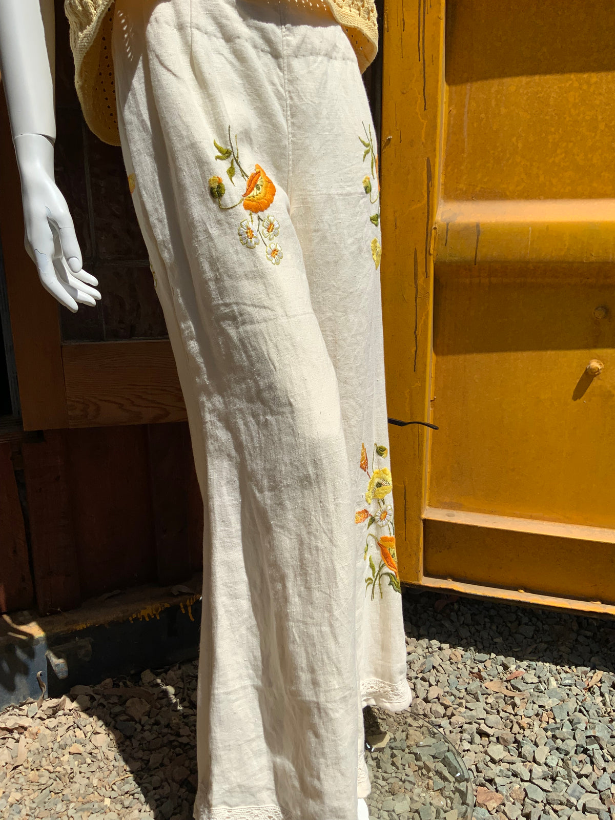 Upcycled embroidered linen tablecloth into "Flower Power" Bell Bottoms