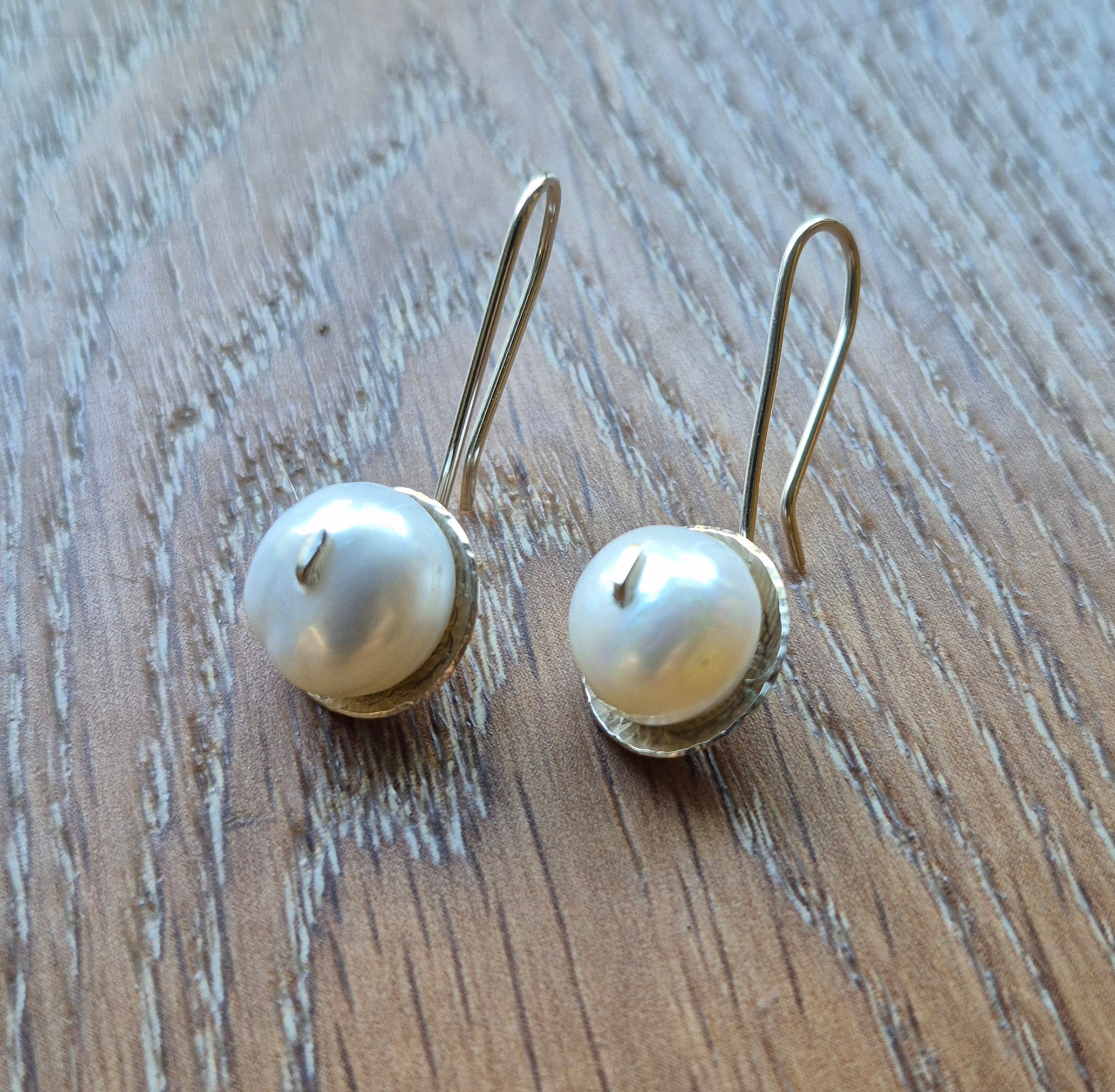 Water pearl earrings.