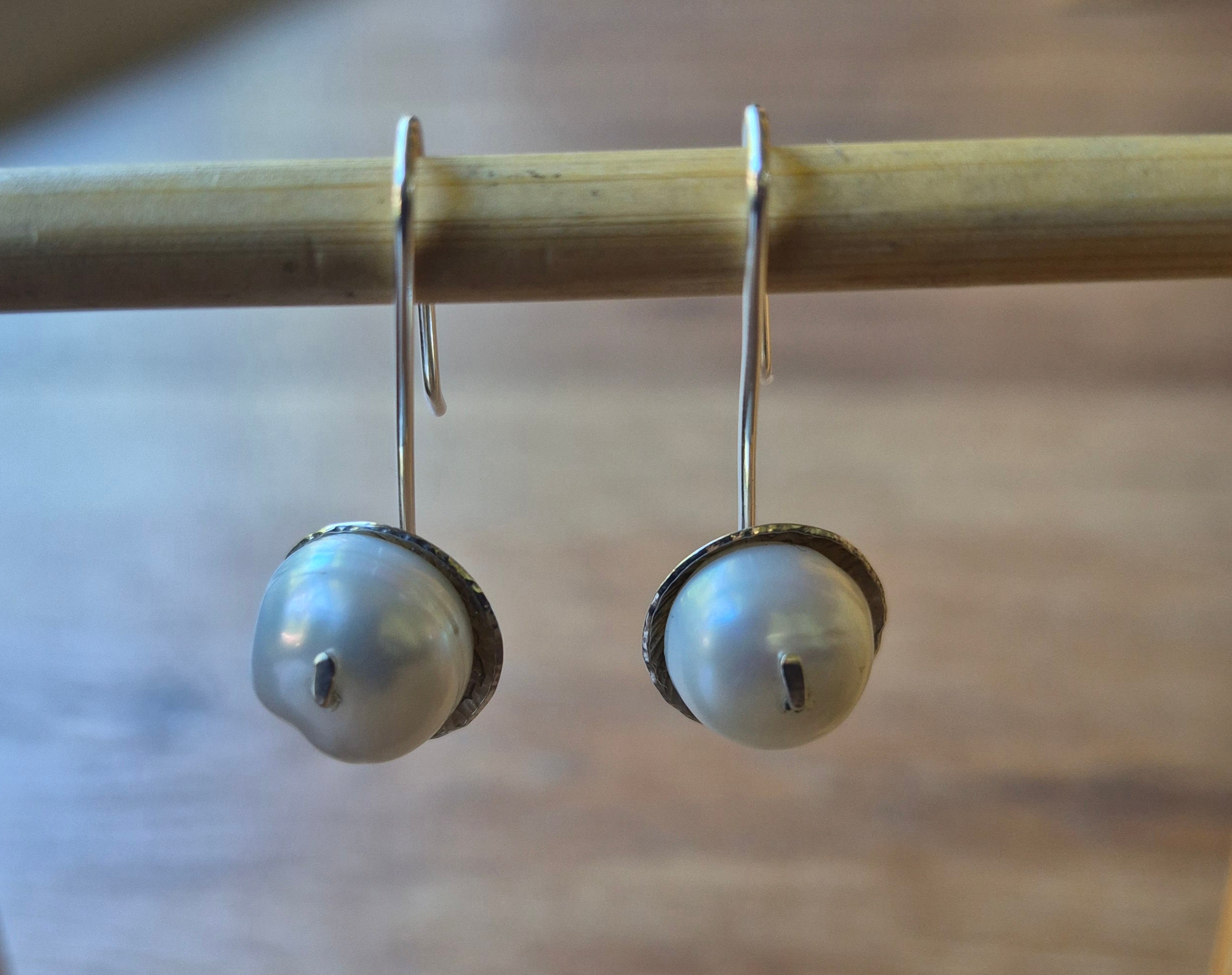 Water pearl earrings.