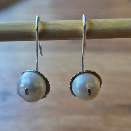 Water pearl earrings.