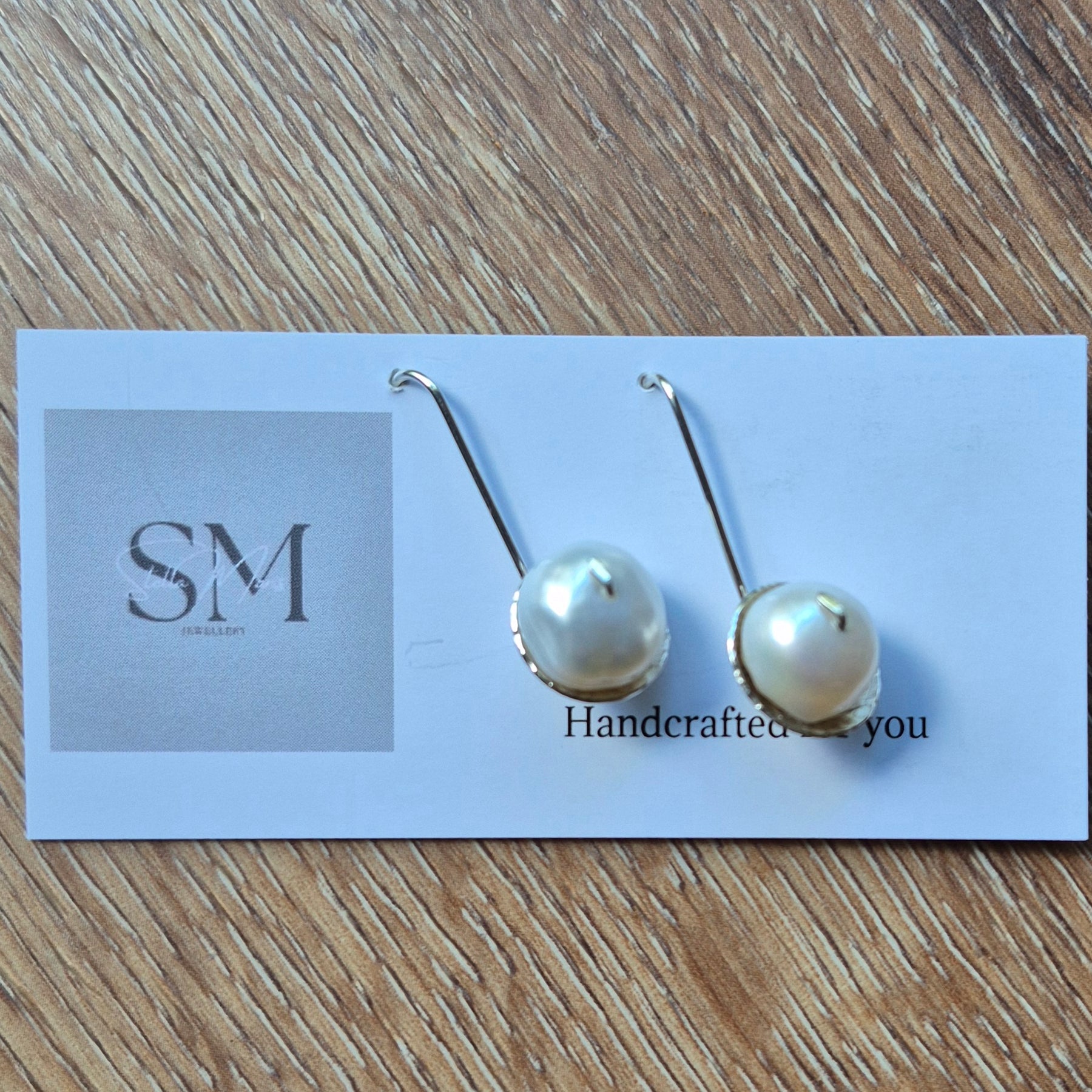 Water pearl earrings.