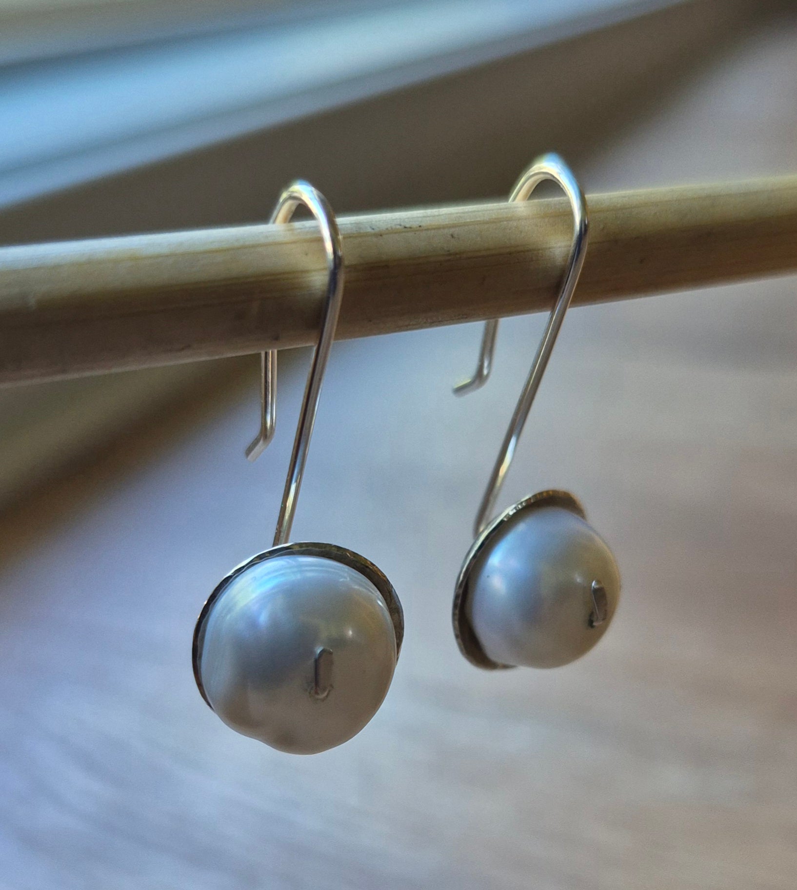 Water pearl earrings.