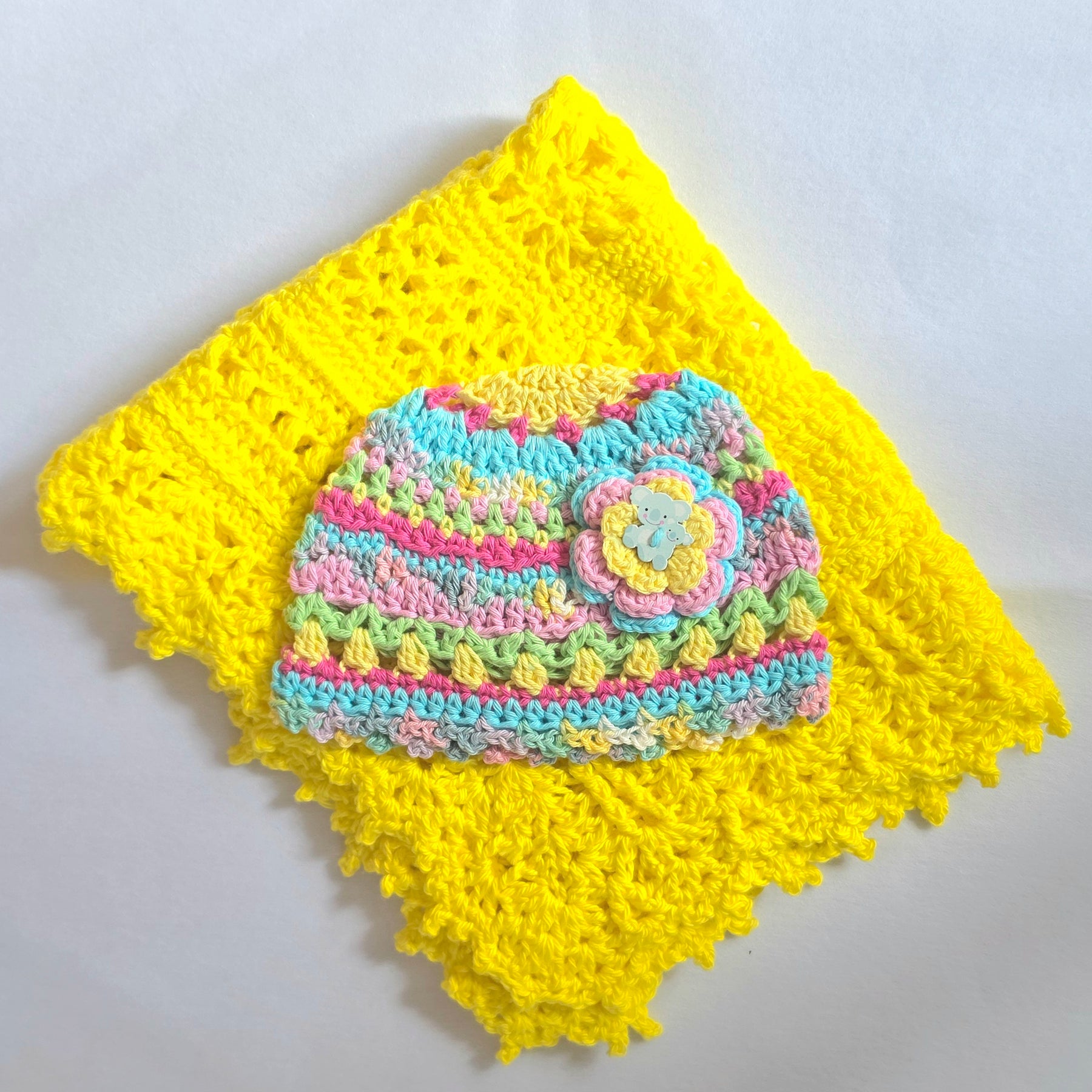 Crocheted Baby Hat with Flower Detail
