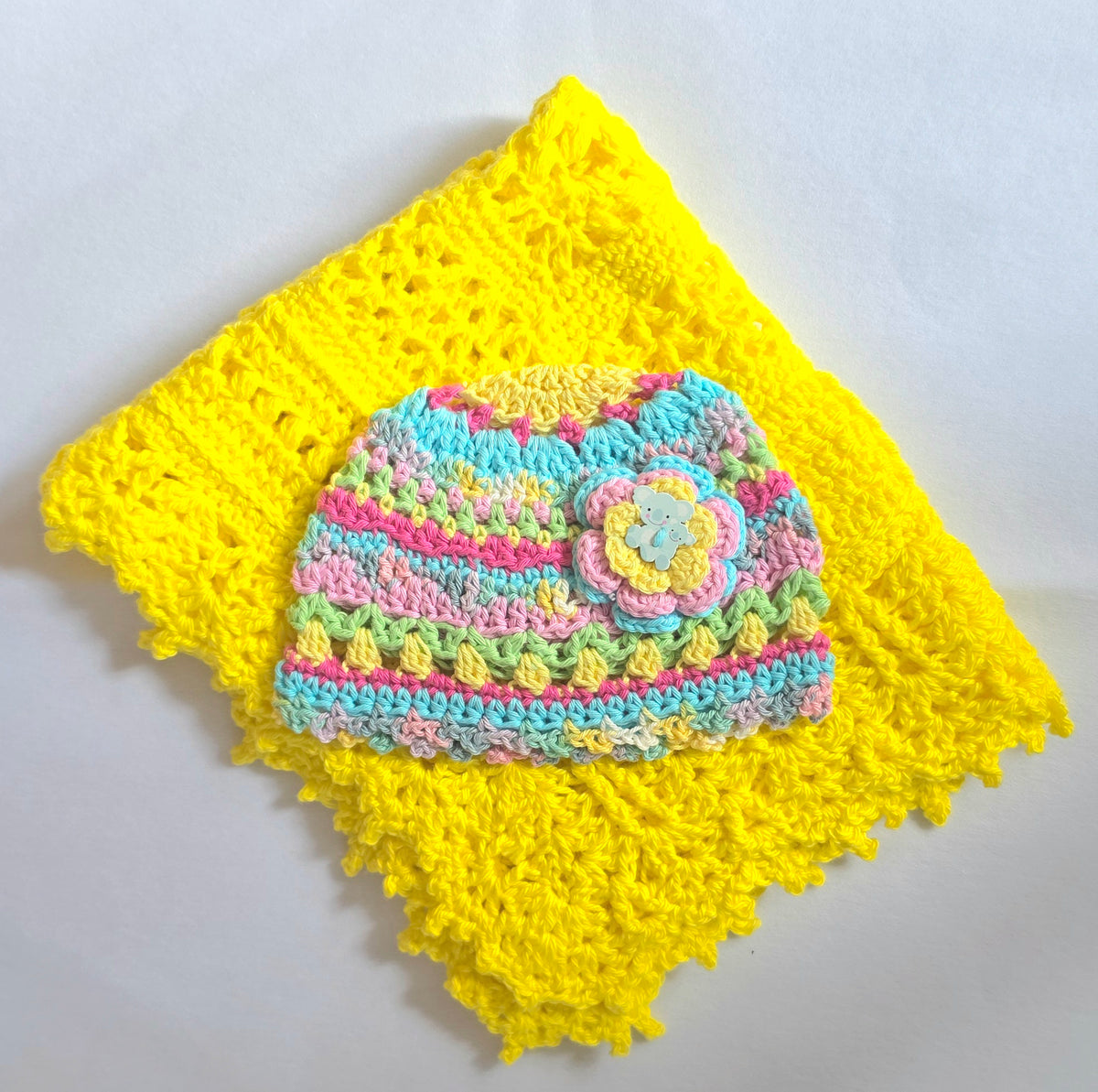 Crocheted Baby Hat with Flower Detail