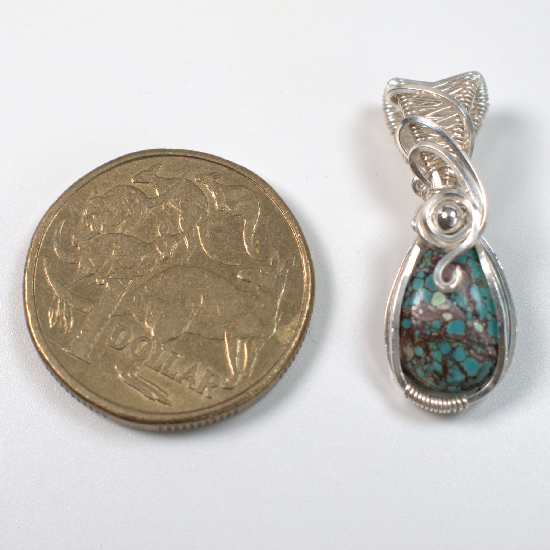 Wire Wrapped Tibetan Turquoise Keepsake Pendant