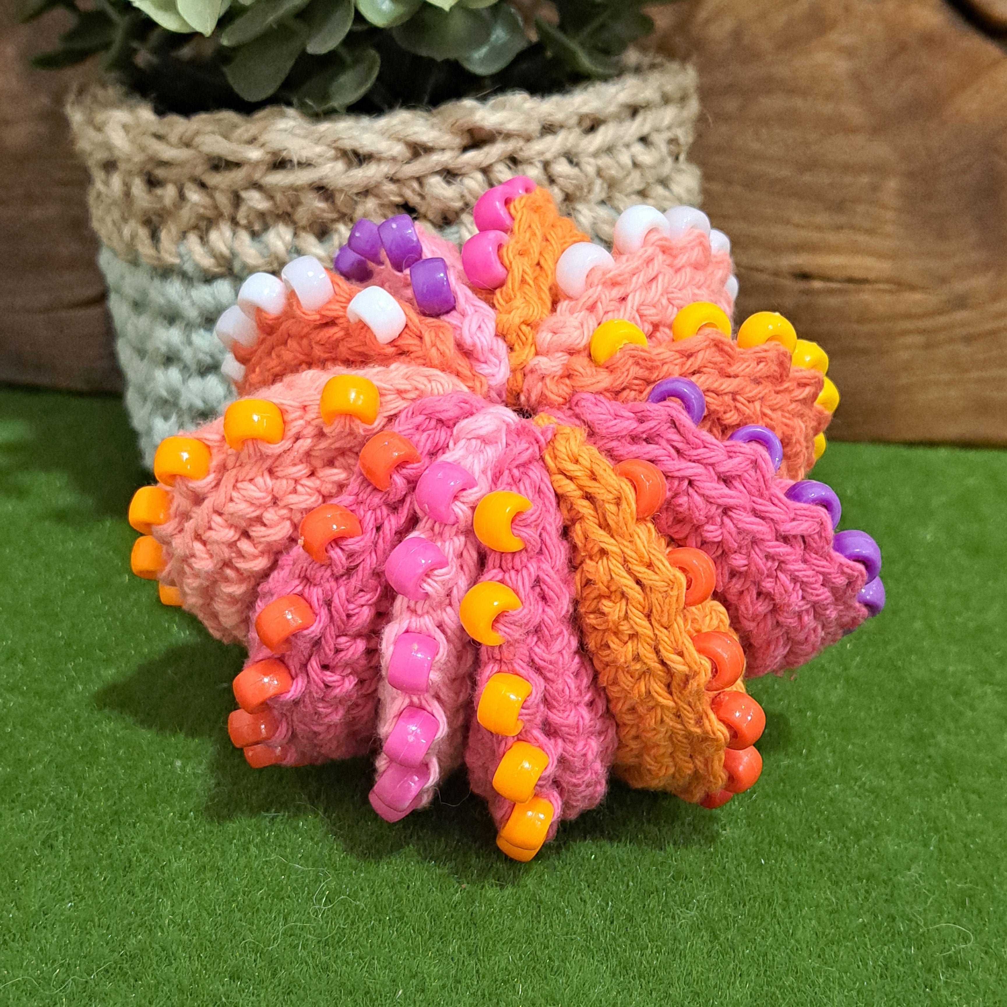 Crochet fidget stress ball/beaded/pinks and oranges