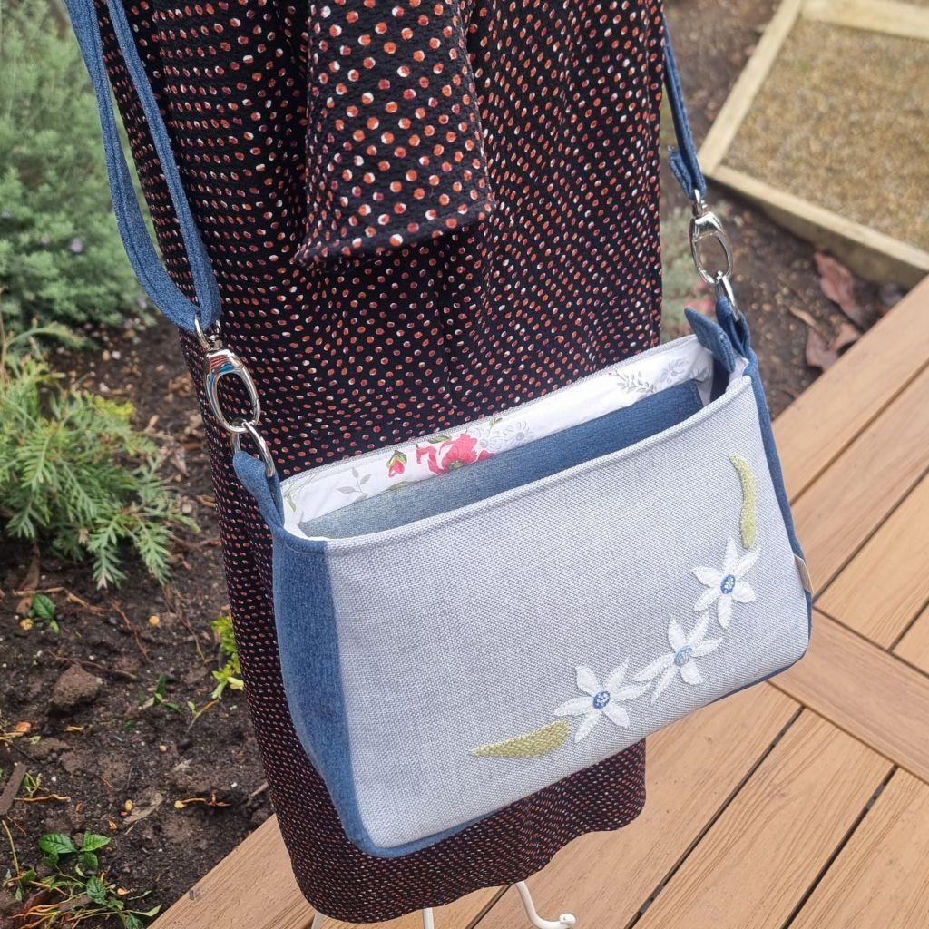 Handmade appliqued crossbody zip bag - blue with flannel flowers