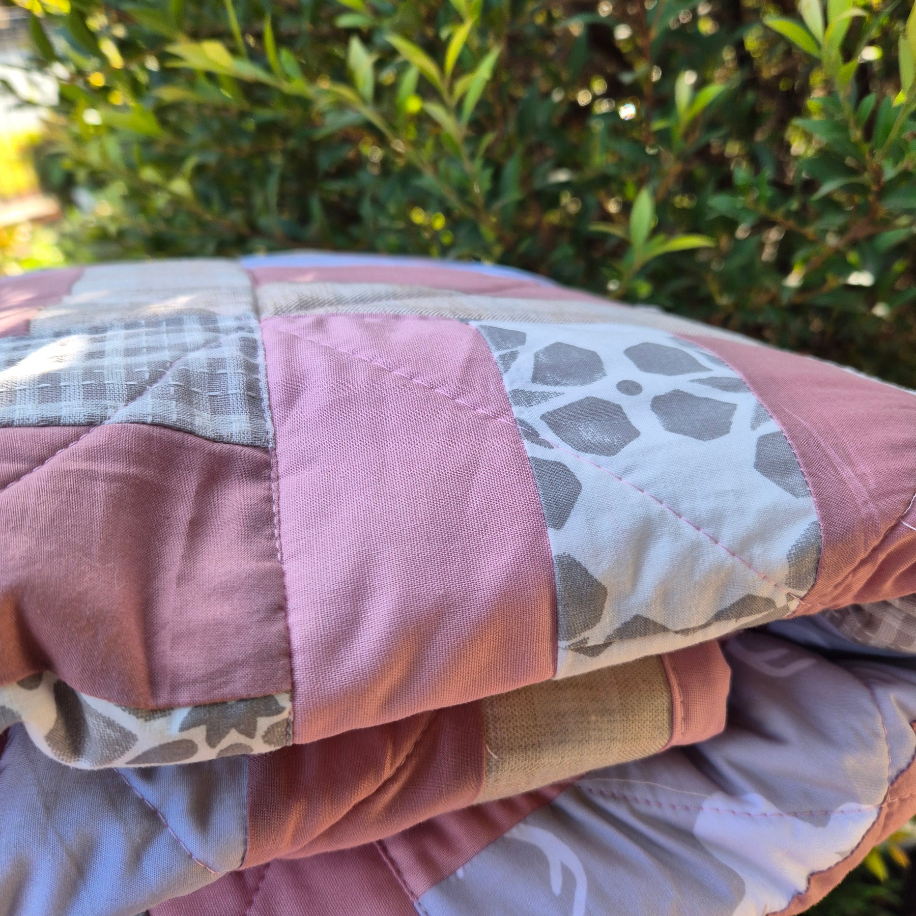 Pink and Grey toned patchwork quilt