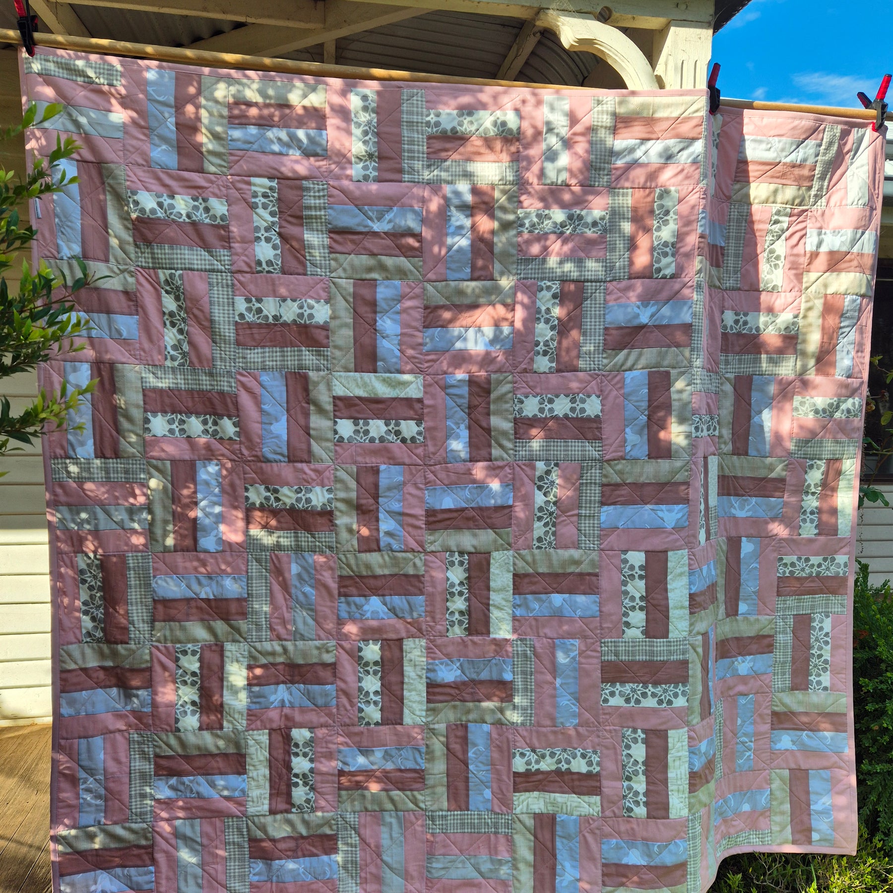 Pink and Grey toned patchwork quilt
