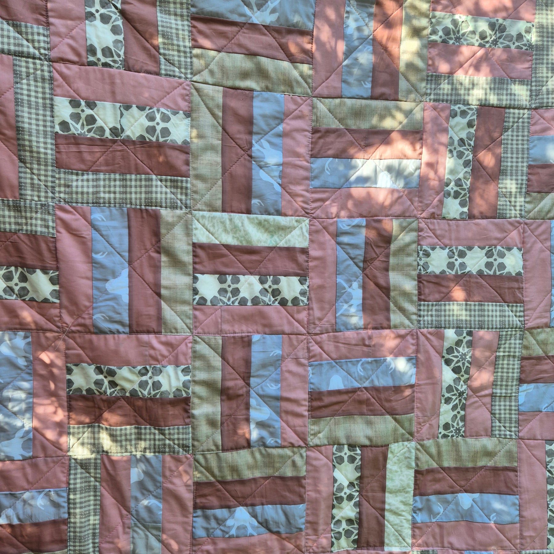 Pink and Grey toned patchwork quilt