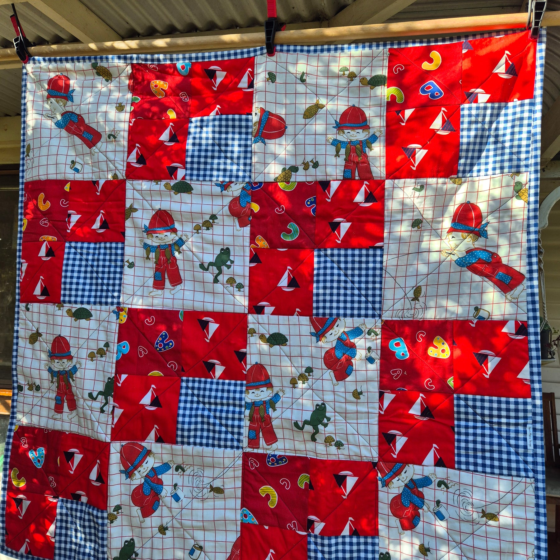 Vintage themed Fisher boy quilt