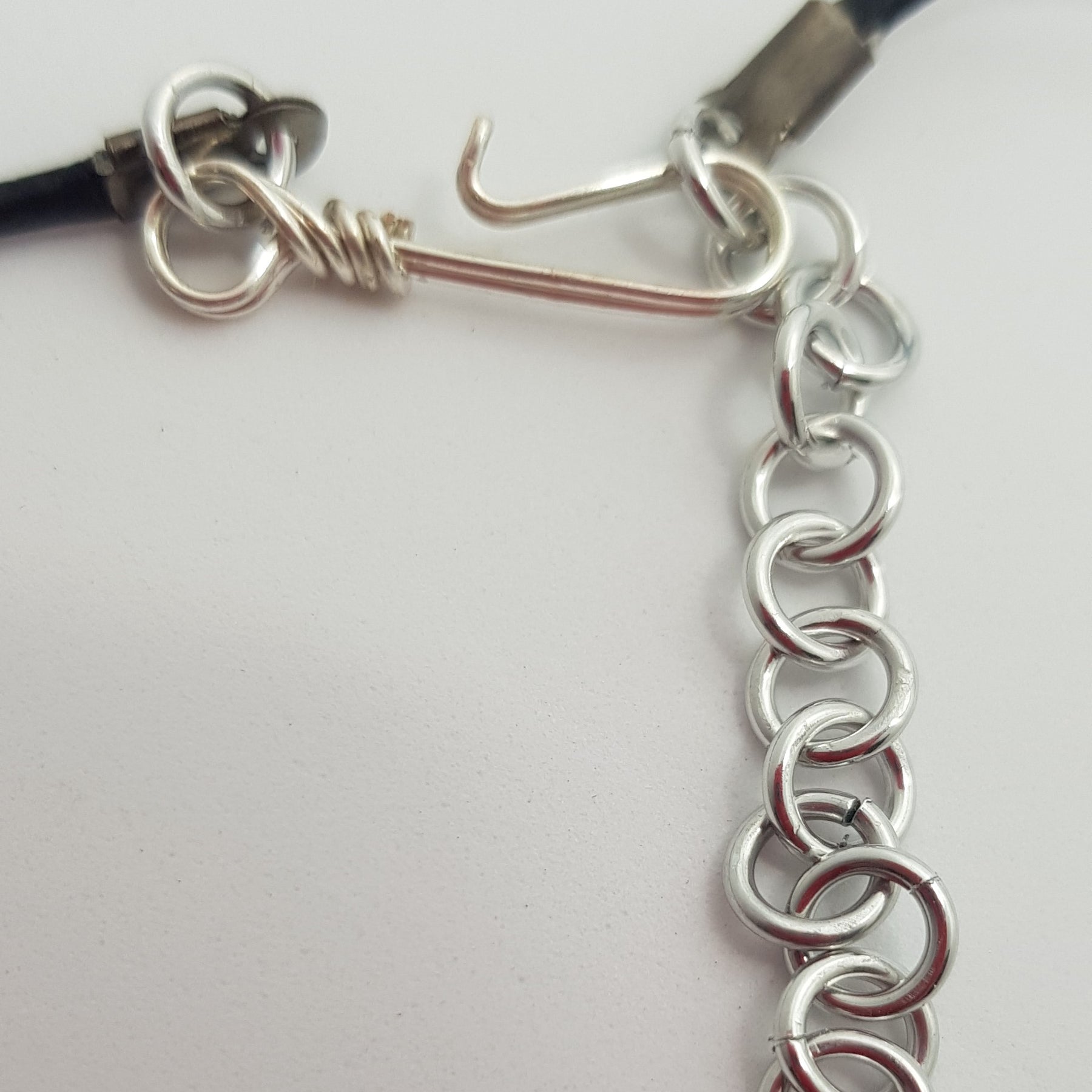 small Blue cabachon wire wrapped with silver wire