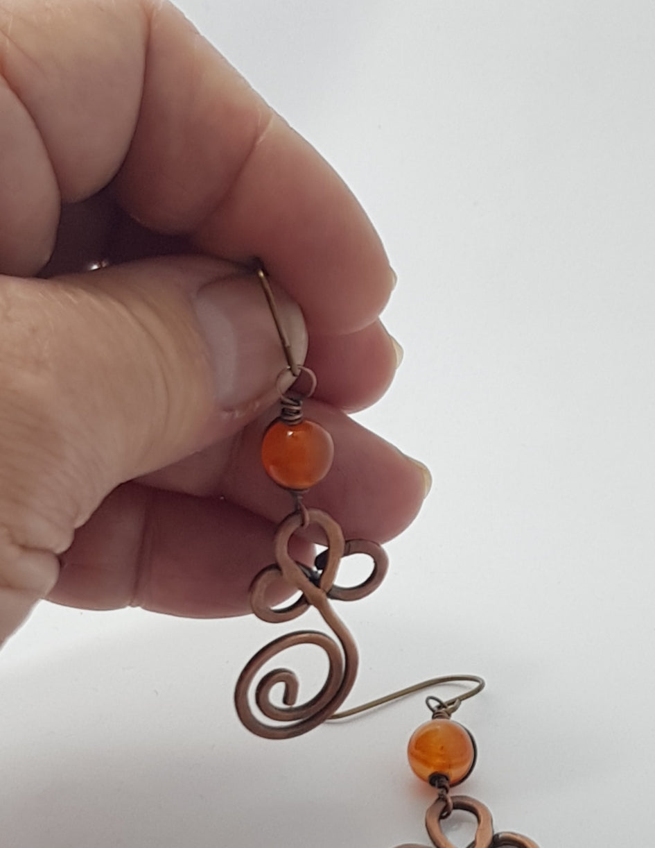 Copper swirl earrings with Carnelian bead #654 AM/E
