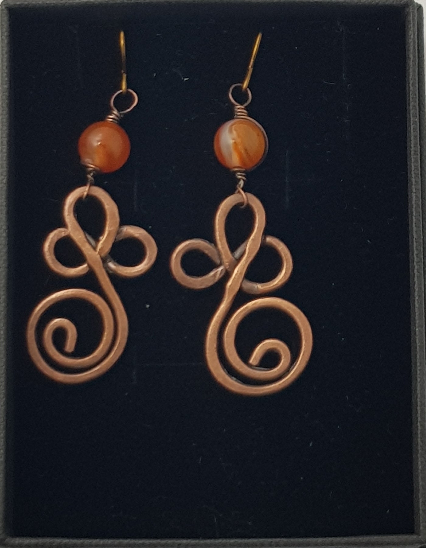 Copper swirl earrings with Carnelian bead #654 AM/E