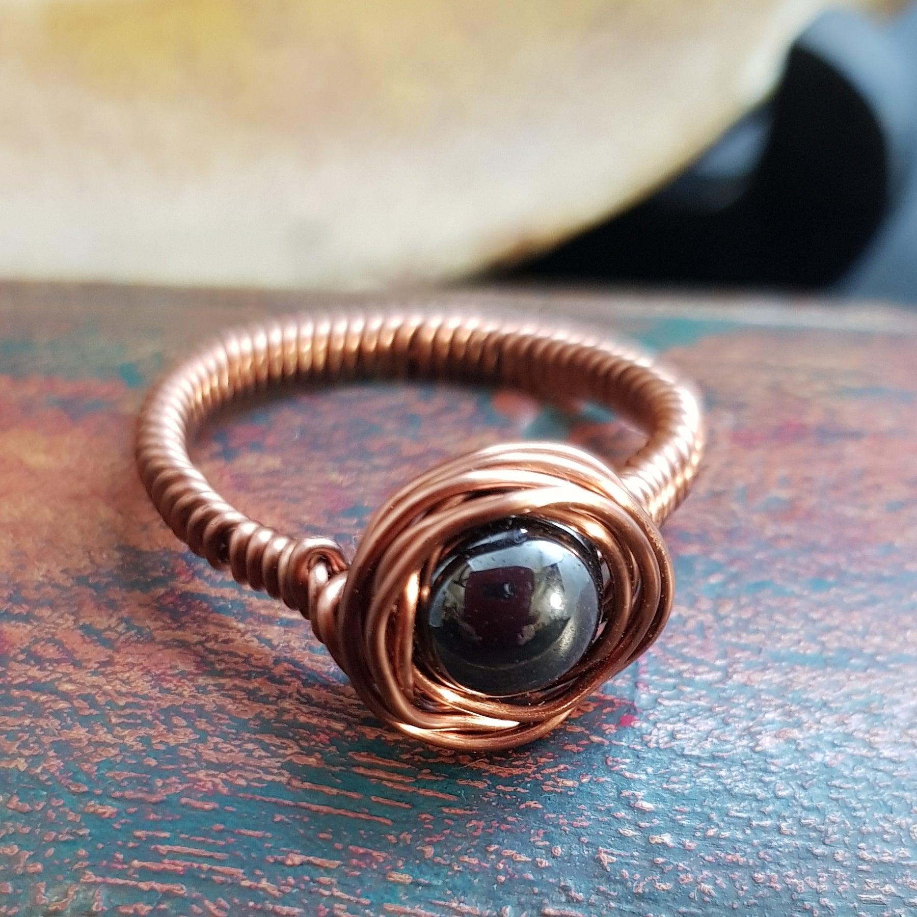 Crazy wrapped ring, in copper and hematite stone (303 AM/R)