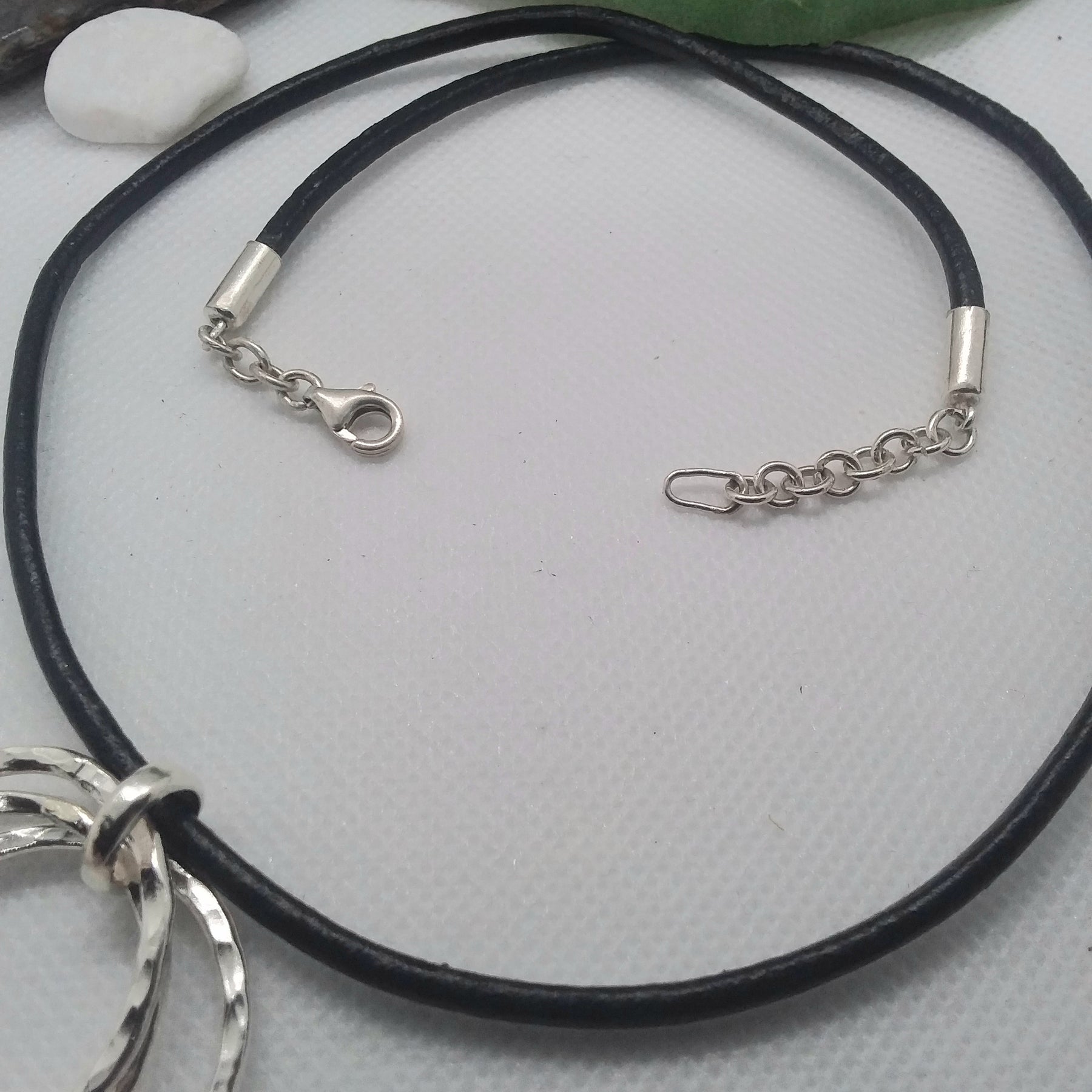 Sterling Silver three circle pendant with neoprene black neckpiece