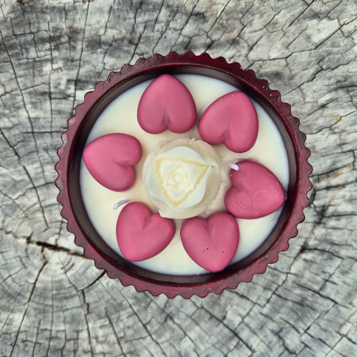 Round burgundy concrete bowl candle with tulip flower