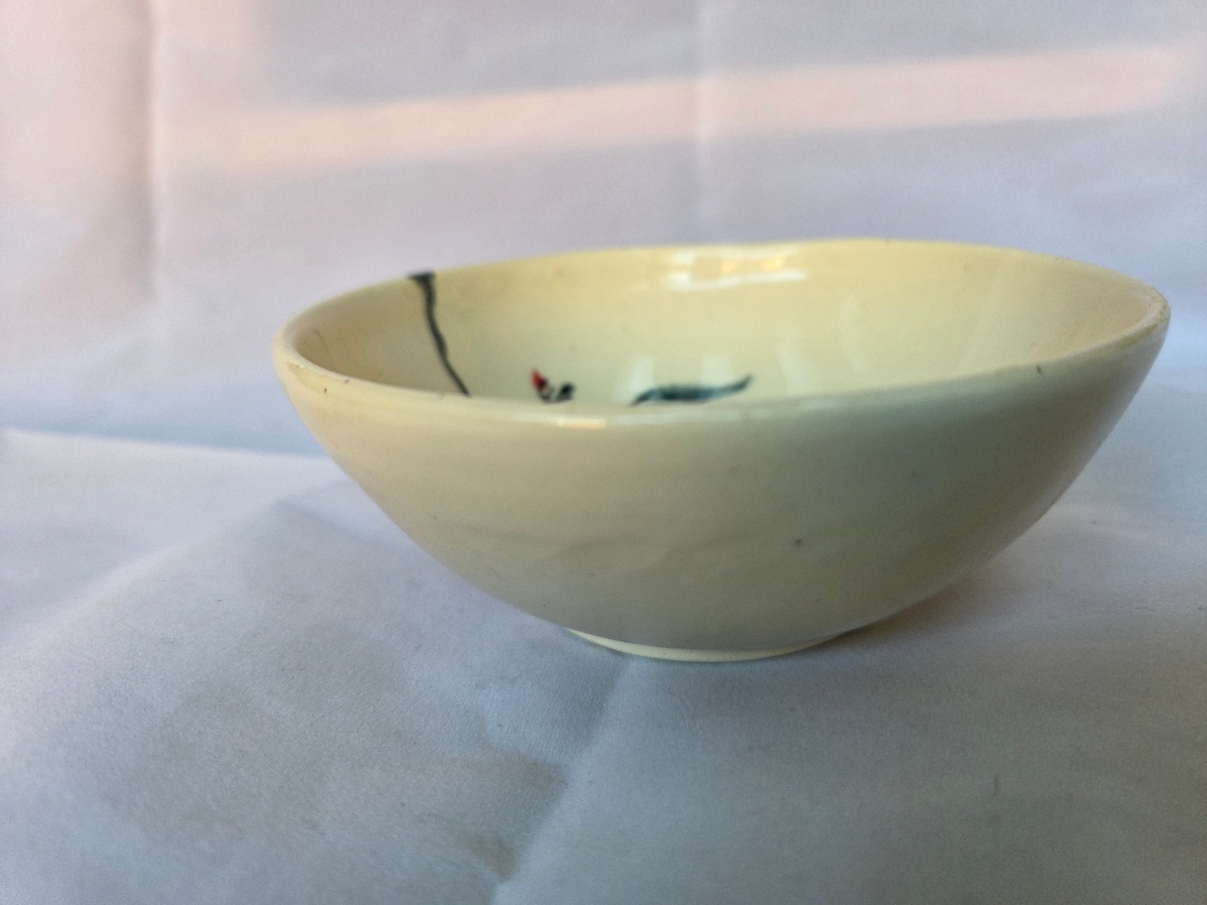 Hand painted floral gumnut design ceramic dish. 13.5cm