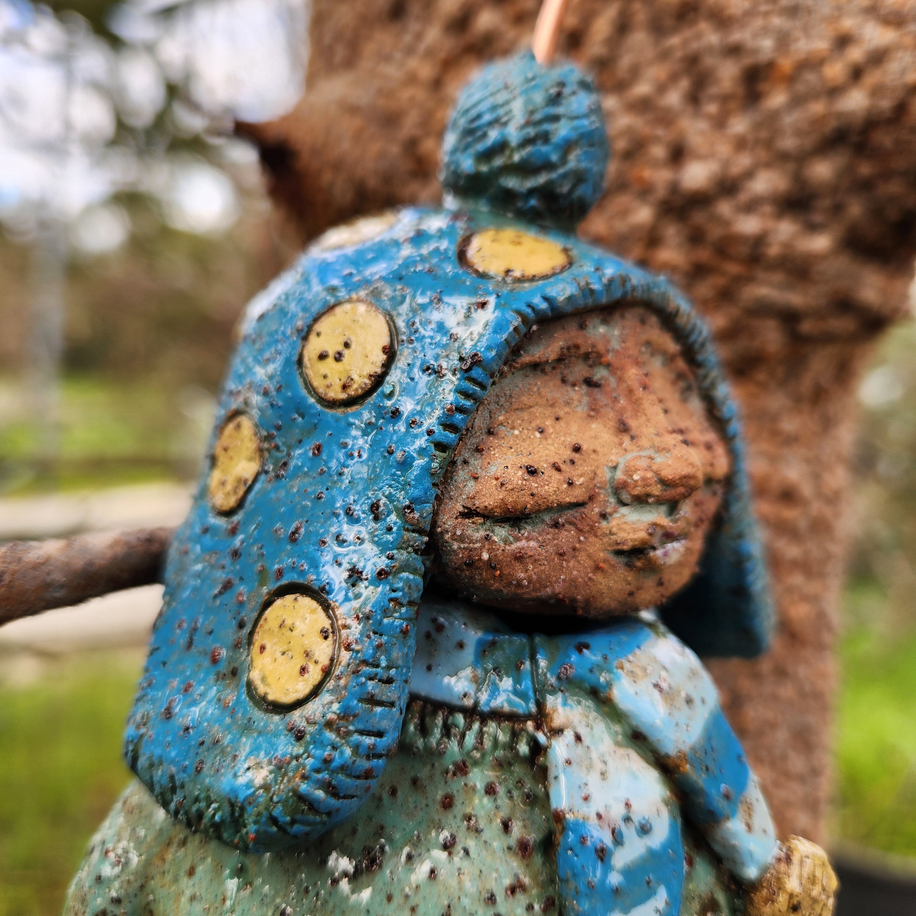 Clay windchime, little girl, bird