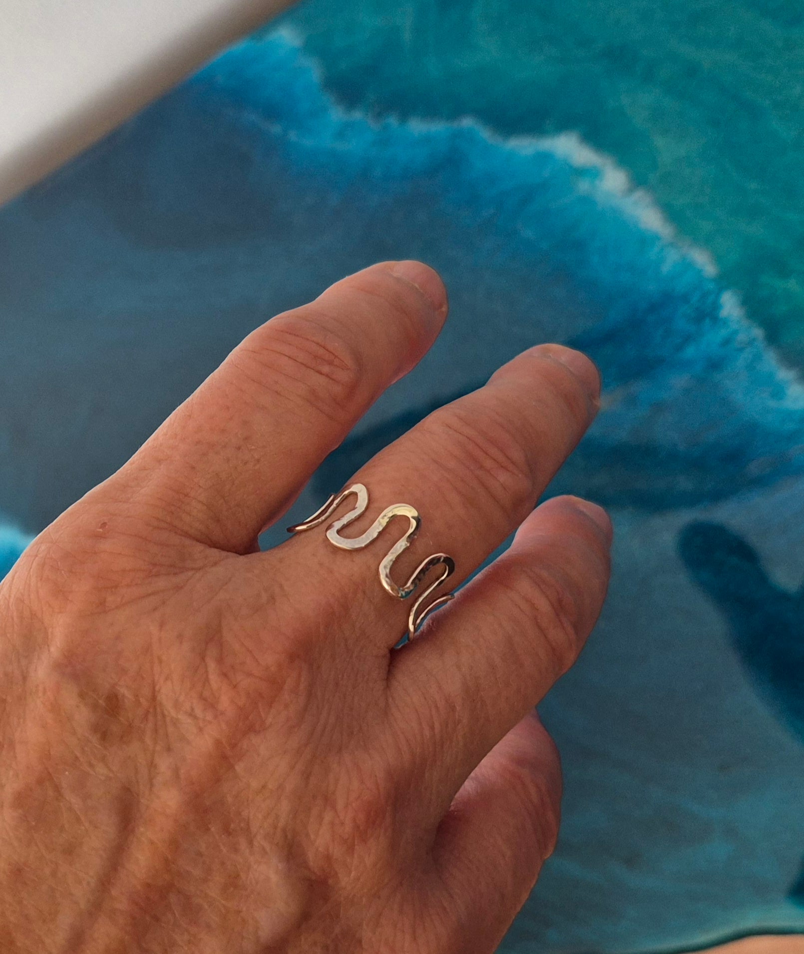 Wave textured ring
