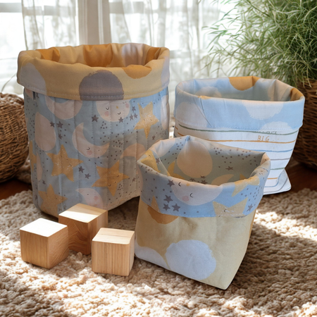Reversible handmade nesting fabric baskets for baby's room