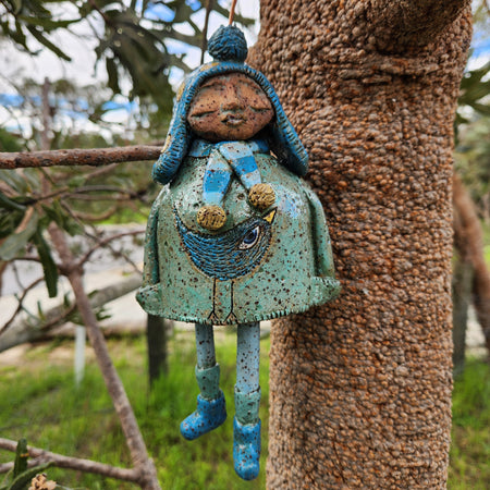 Clay windchime, little girl, bird