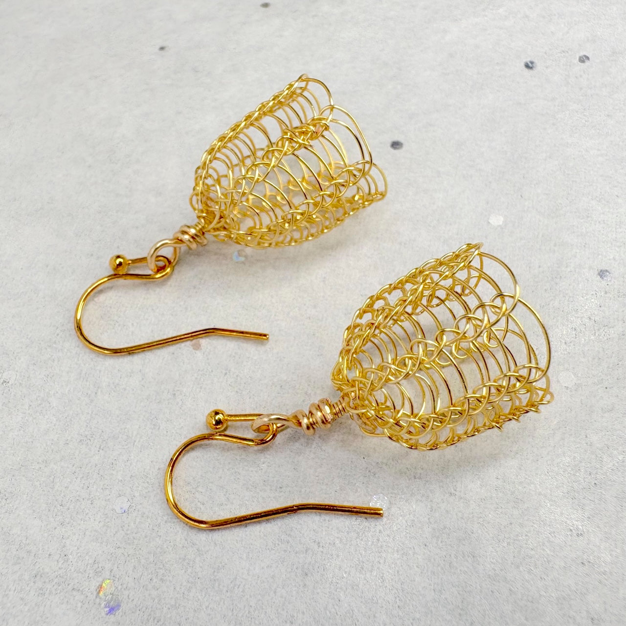 Knitted wire bell earrings
