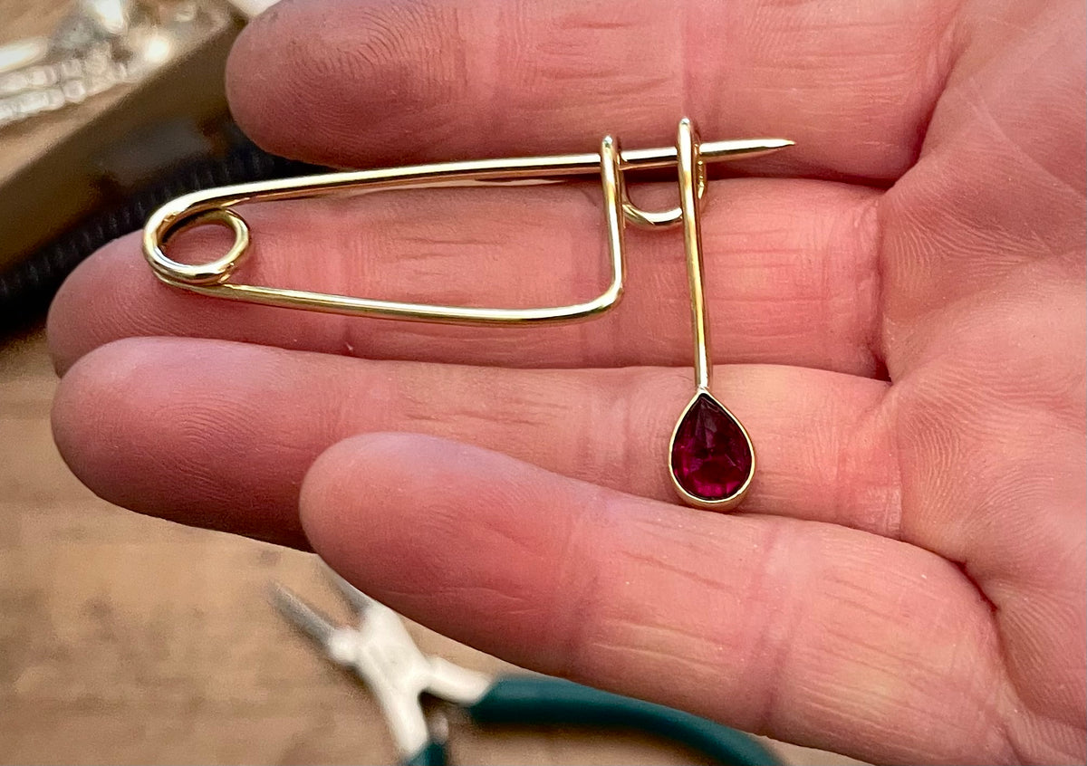 Brass and Ruby teardrop brooch