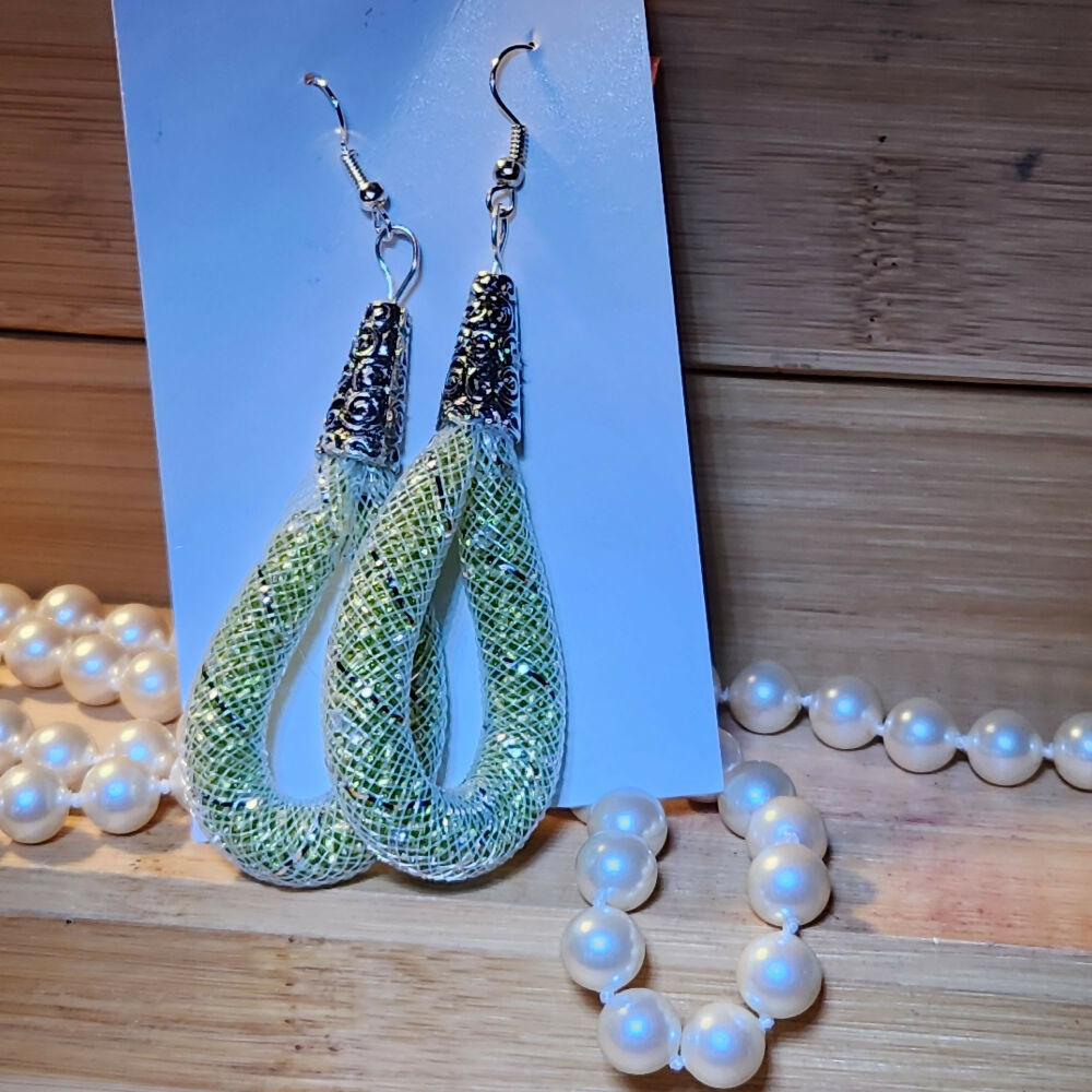 white nylon mesh, green bead, dangle hoop earrings.