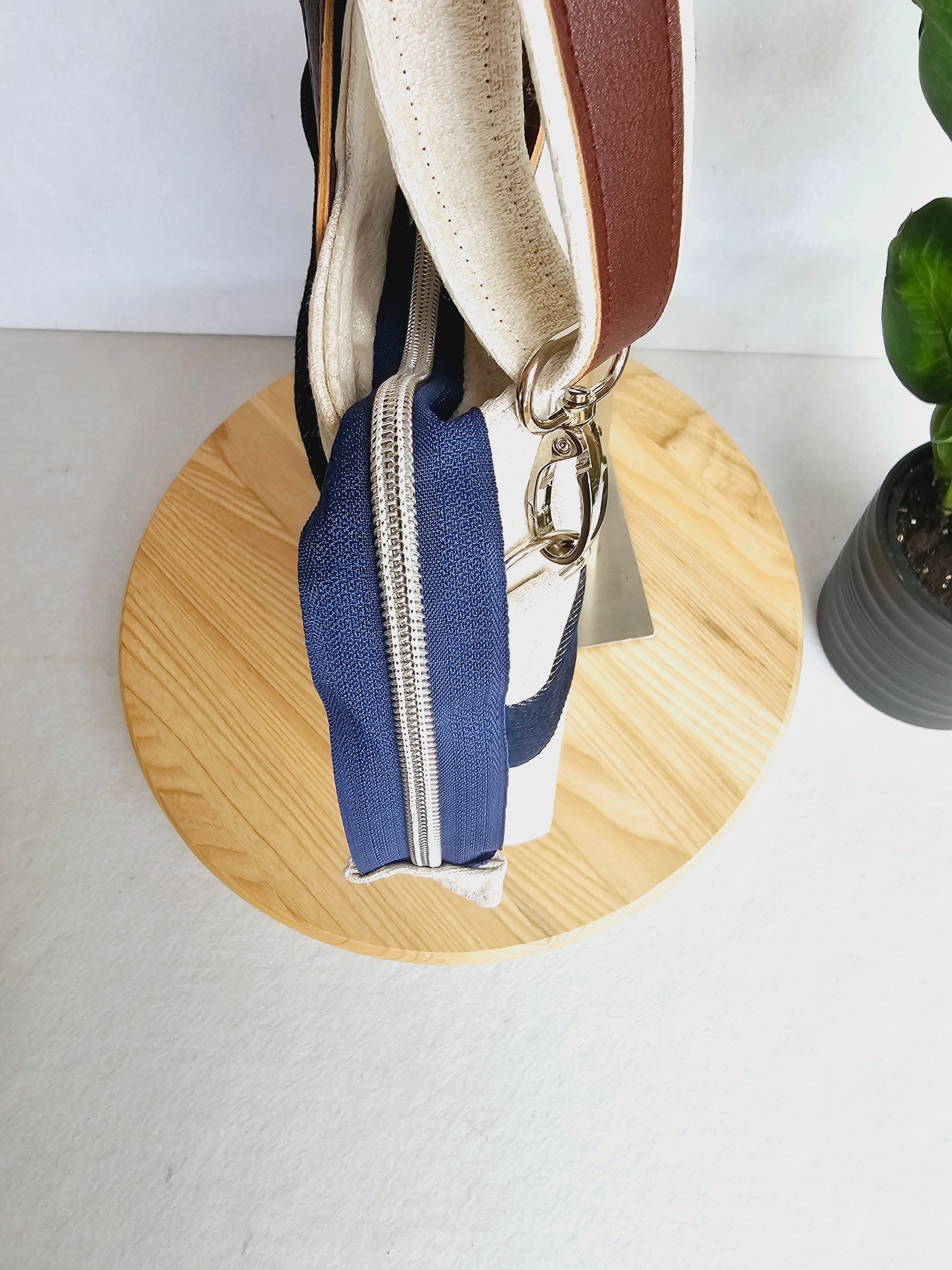 Modern hummingbird cross body bag featuring empowering words with ajustable strap