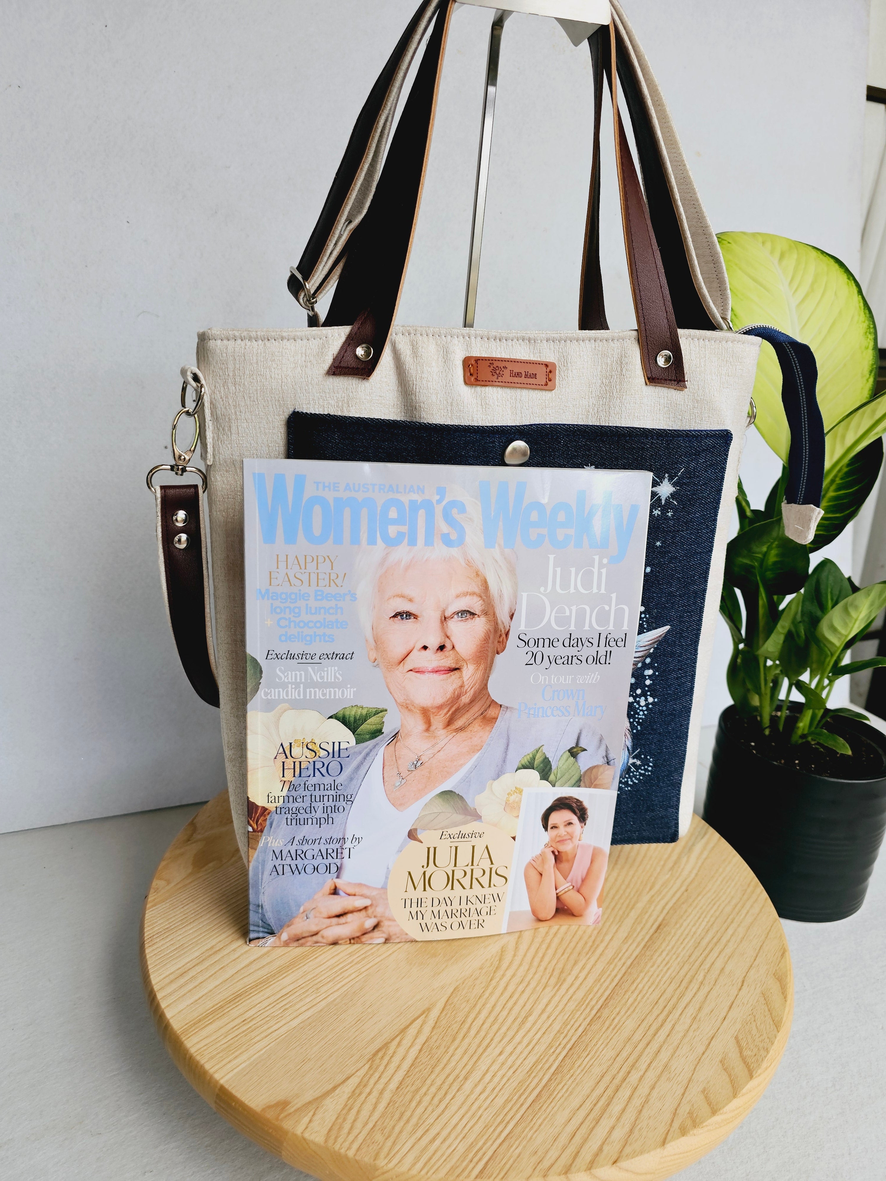 Modern hummingbird cross body bag featuring empowering words with ajustable strap