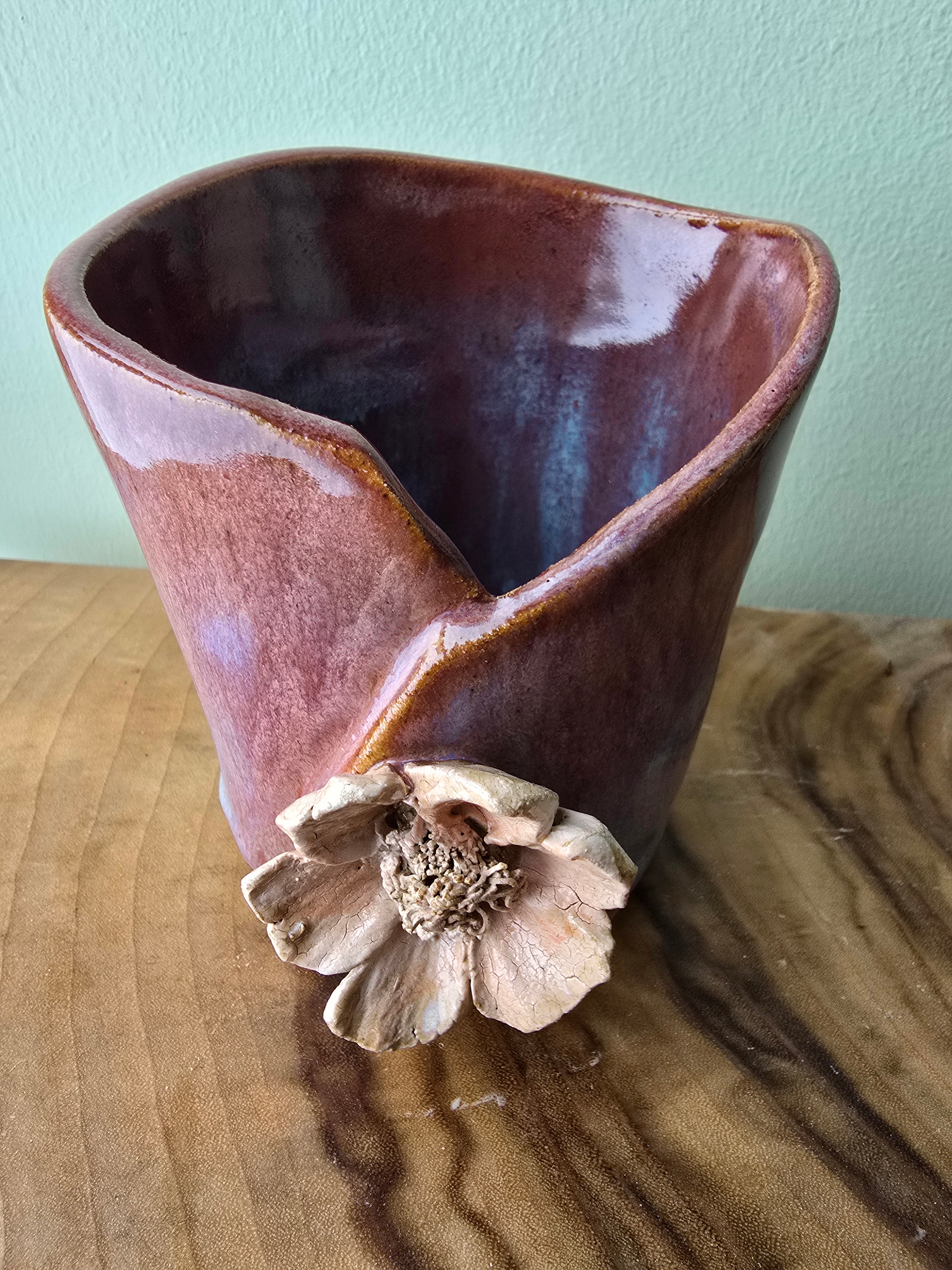 Simple pink vase with flower