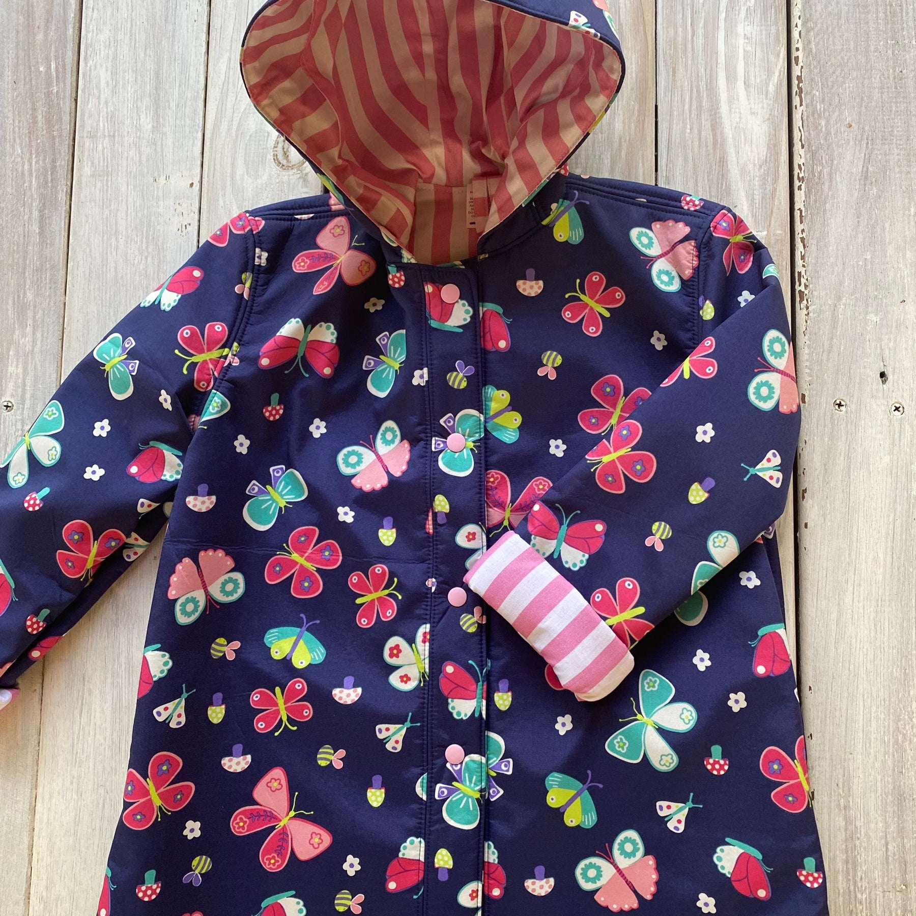 Showerproof Butterflies on Blue Hooded Jacket size 5