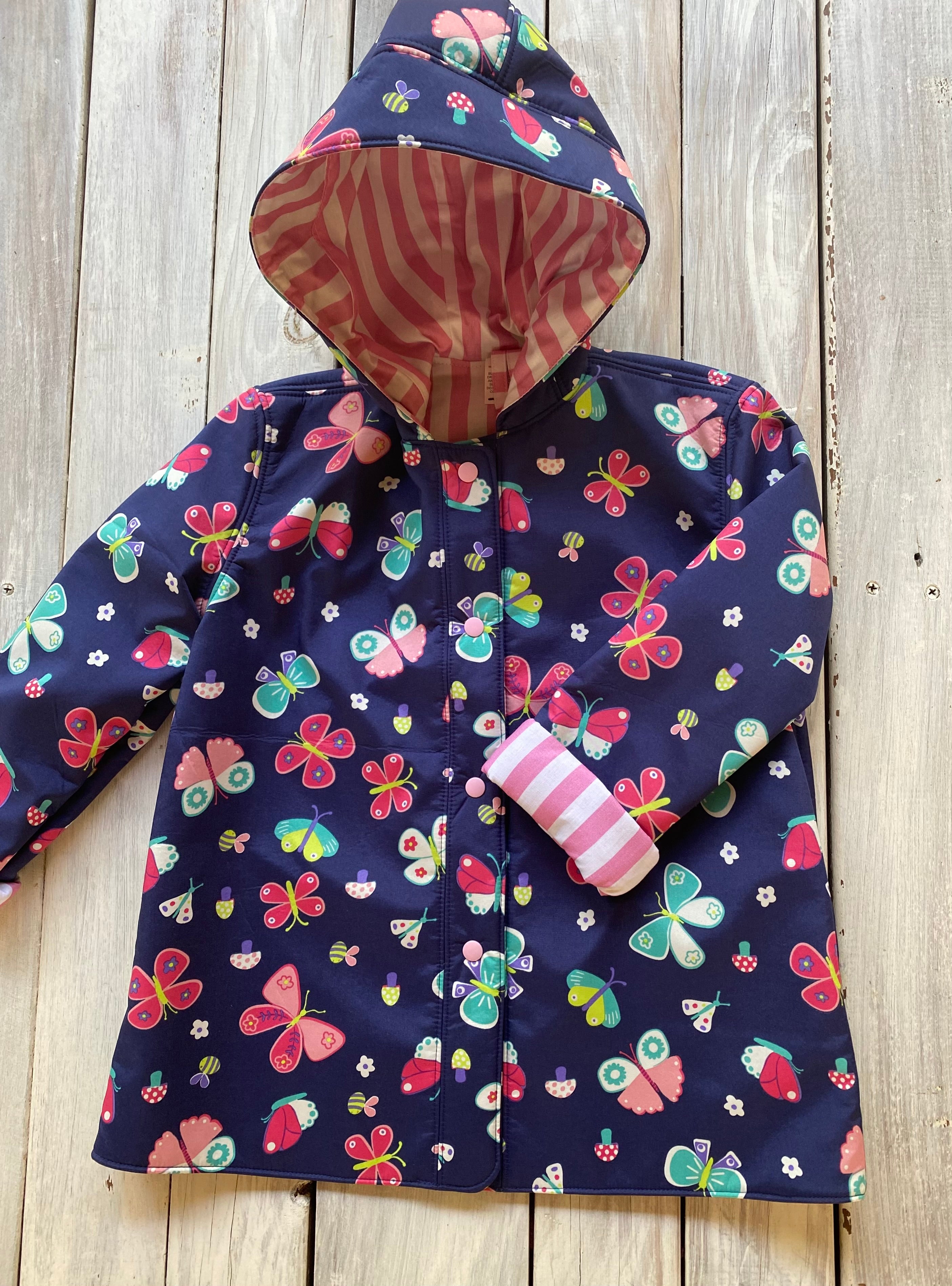 Showerproof Butterflies on Blue Hooded Jacket size 5