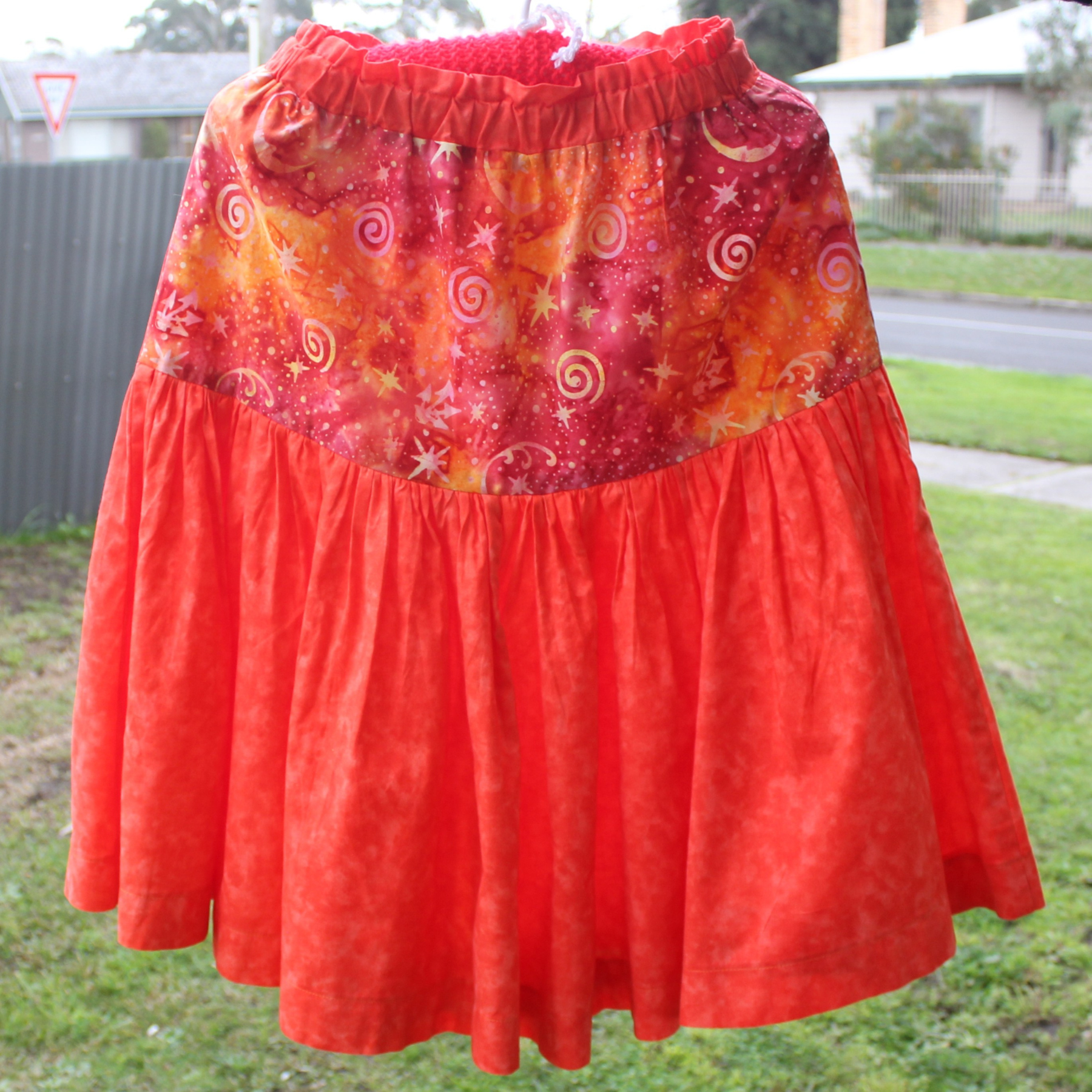 Womens Size Small, Mid Skirt, Orange/Spirals Galaxy.