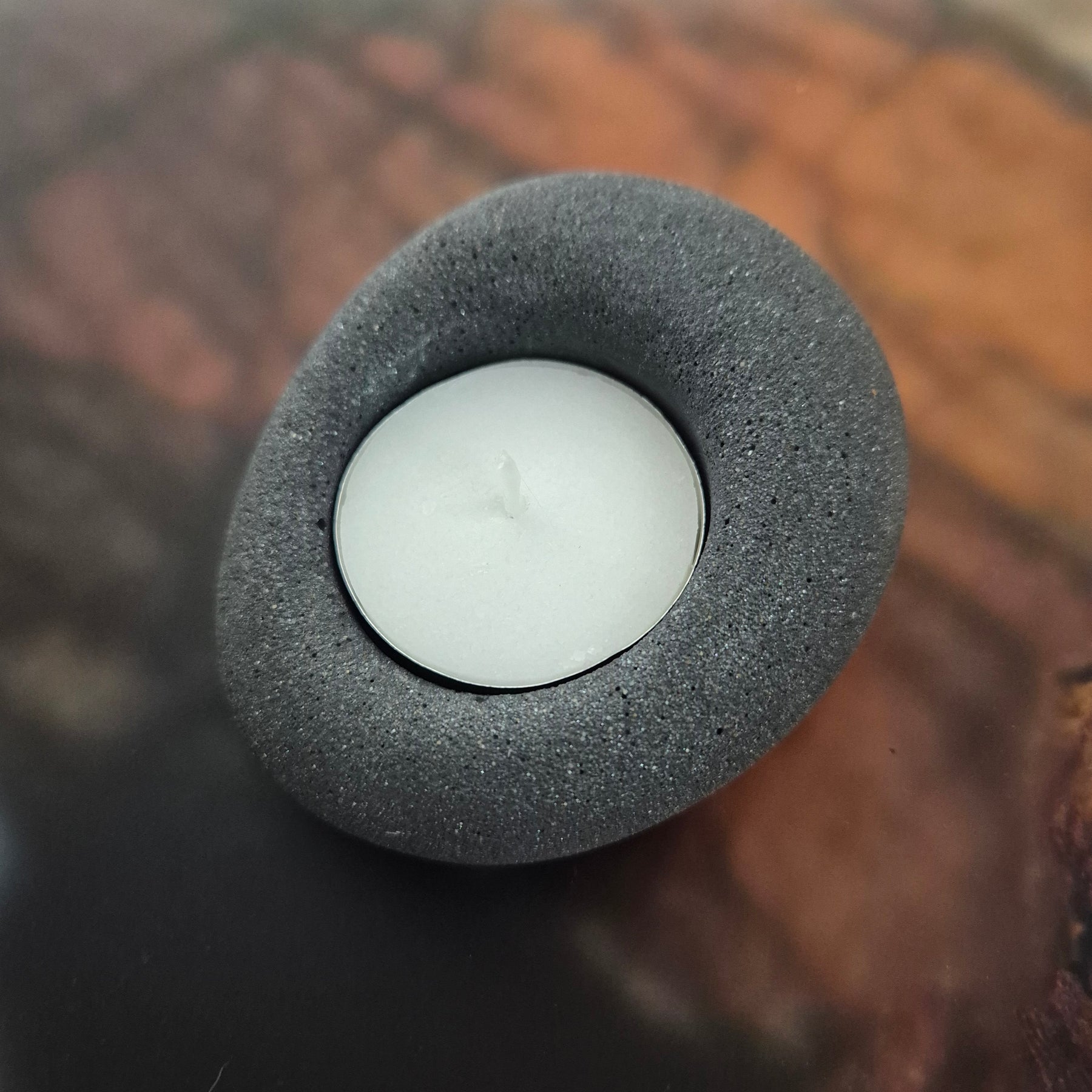 Black eco-stone pebble shaped tealight candle holder