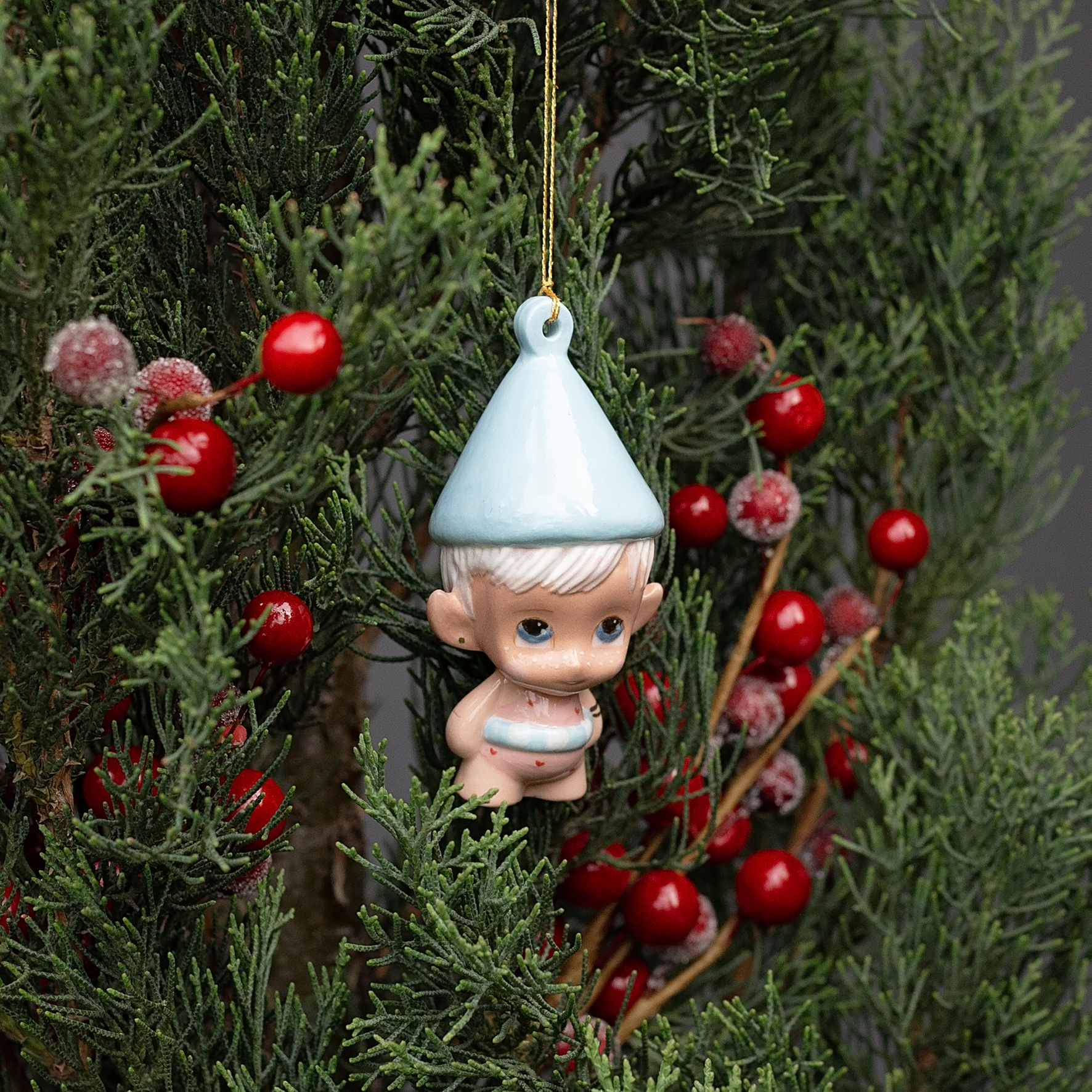 Handmade Porcelain Christmas ornament. One-of-a-kind. Shelly the Swim teacher Elf.