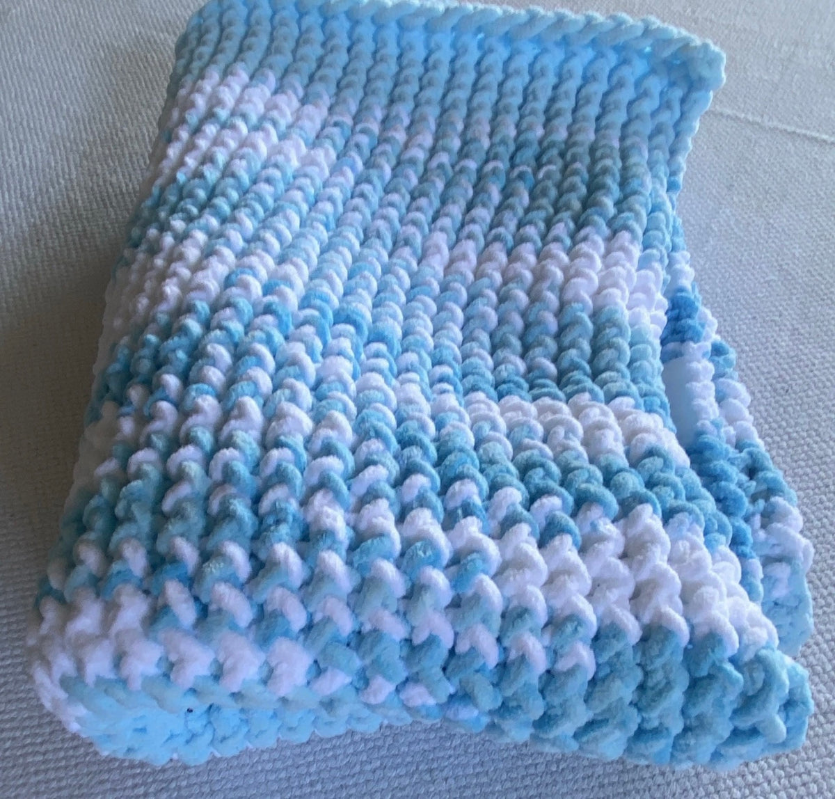 Blue and white baby blanket or lap blanket