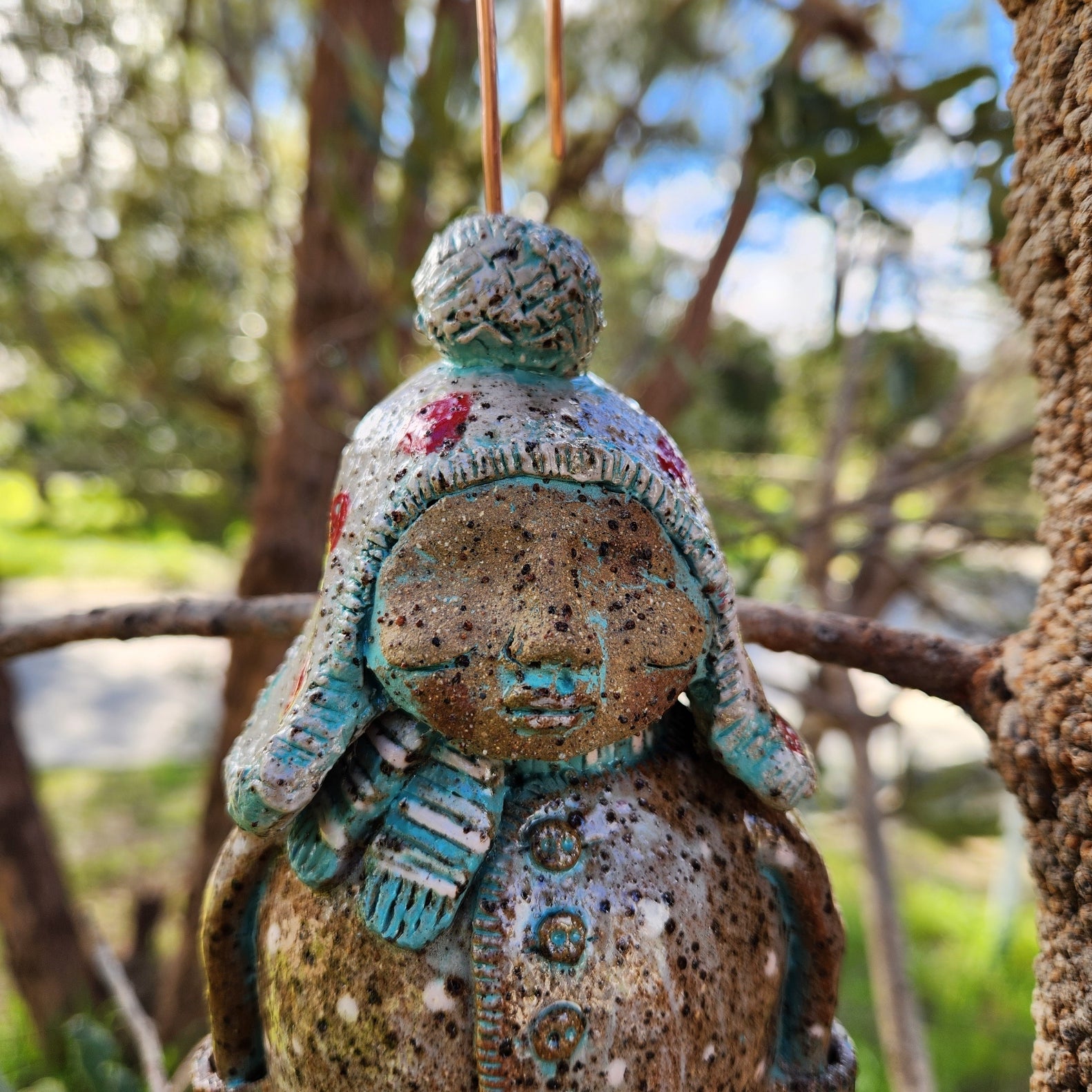 Clay windchime, little girl,