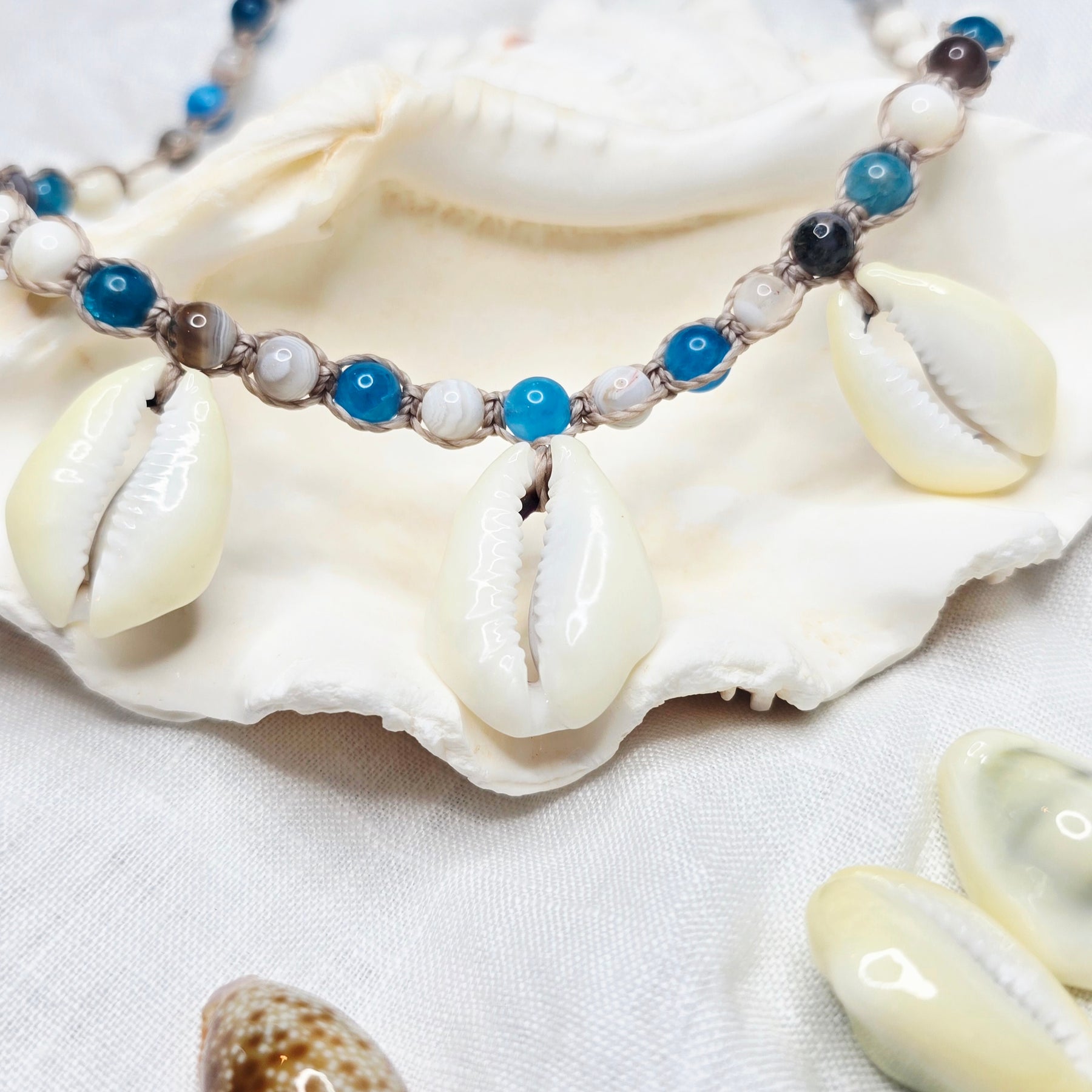 Cowrie Shell Macrame Necklace with Blue Apatite